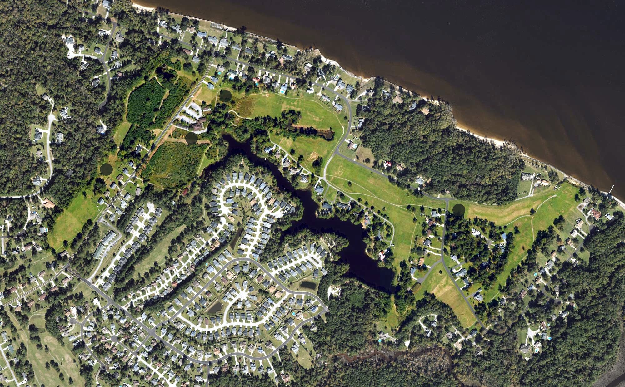 Aerial view of Carolina Pines Golf and Country Club, NC, with its hole routing marked