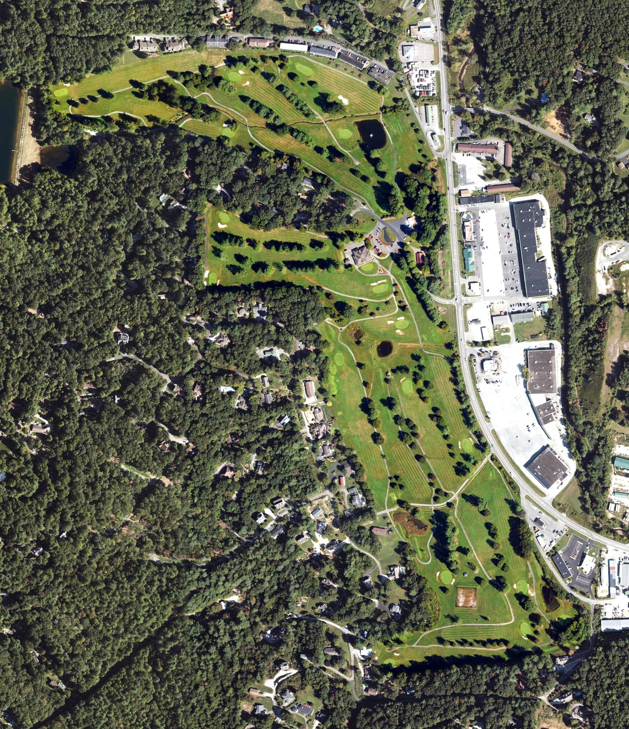 Aerial view of Grassy Creek Golf & Country Club, NC, with its hole routing marked