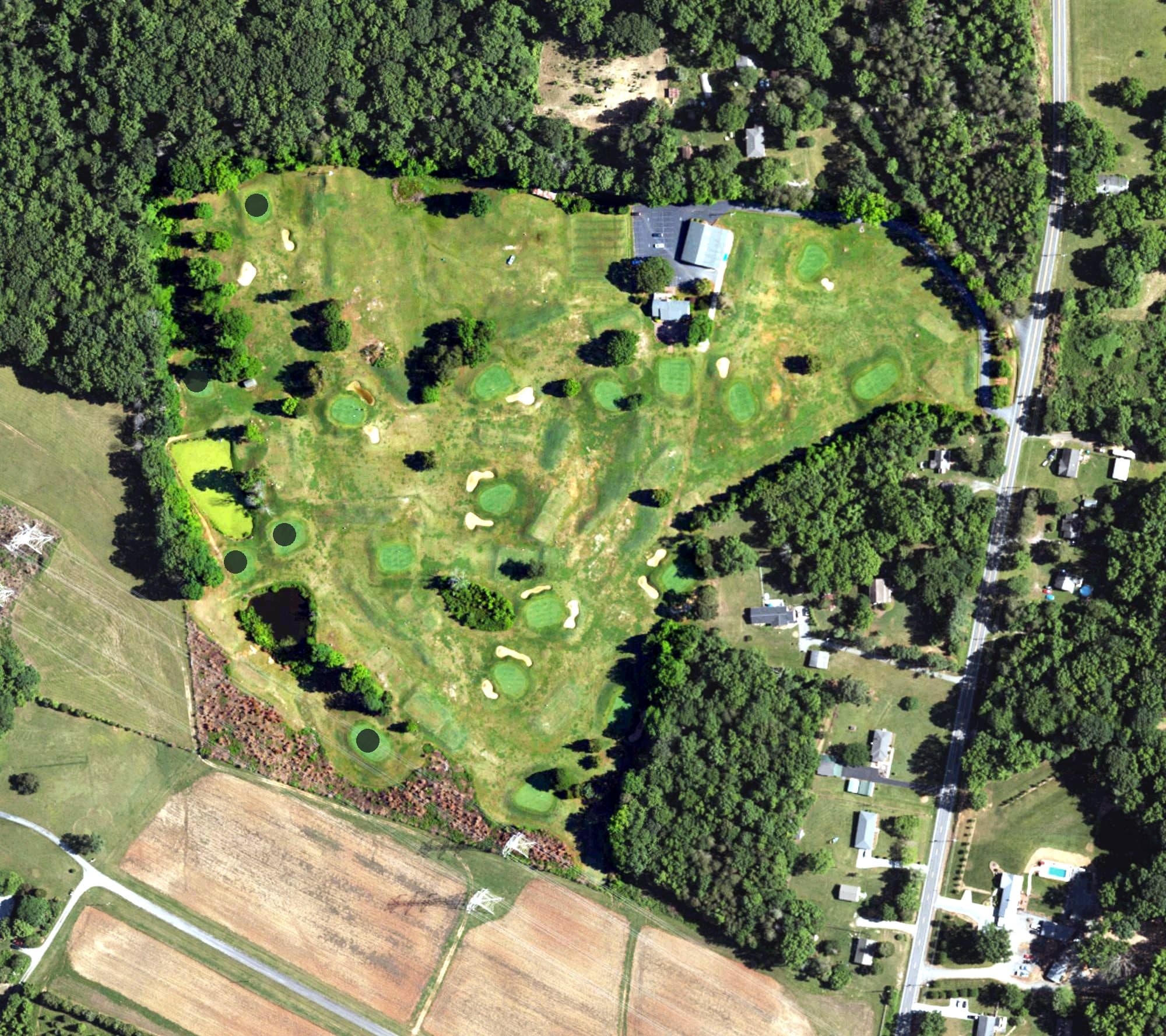 Aerial view of Ironplay, NC, with its hole routing marked