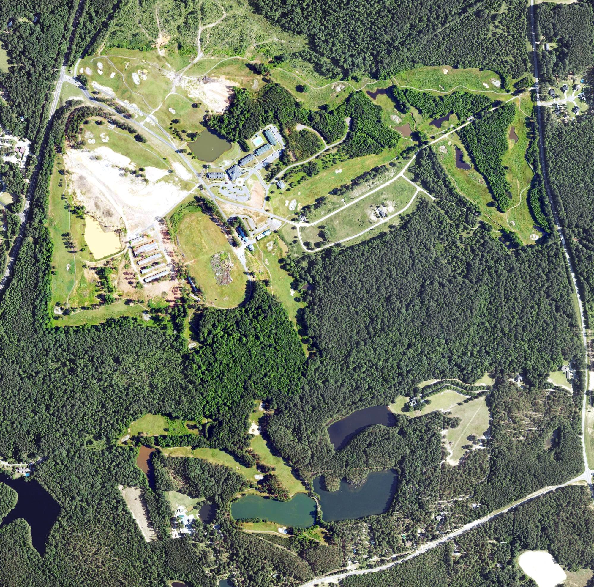 Aerial view of Little River Golf Course, NC, with its hole routing marked