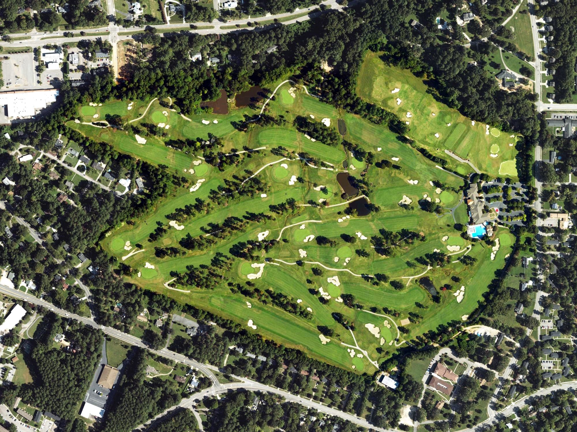 Aerial view of Raleigh Country Club, NC, with its hole routing marked
