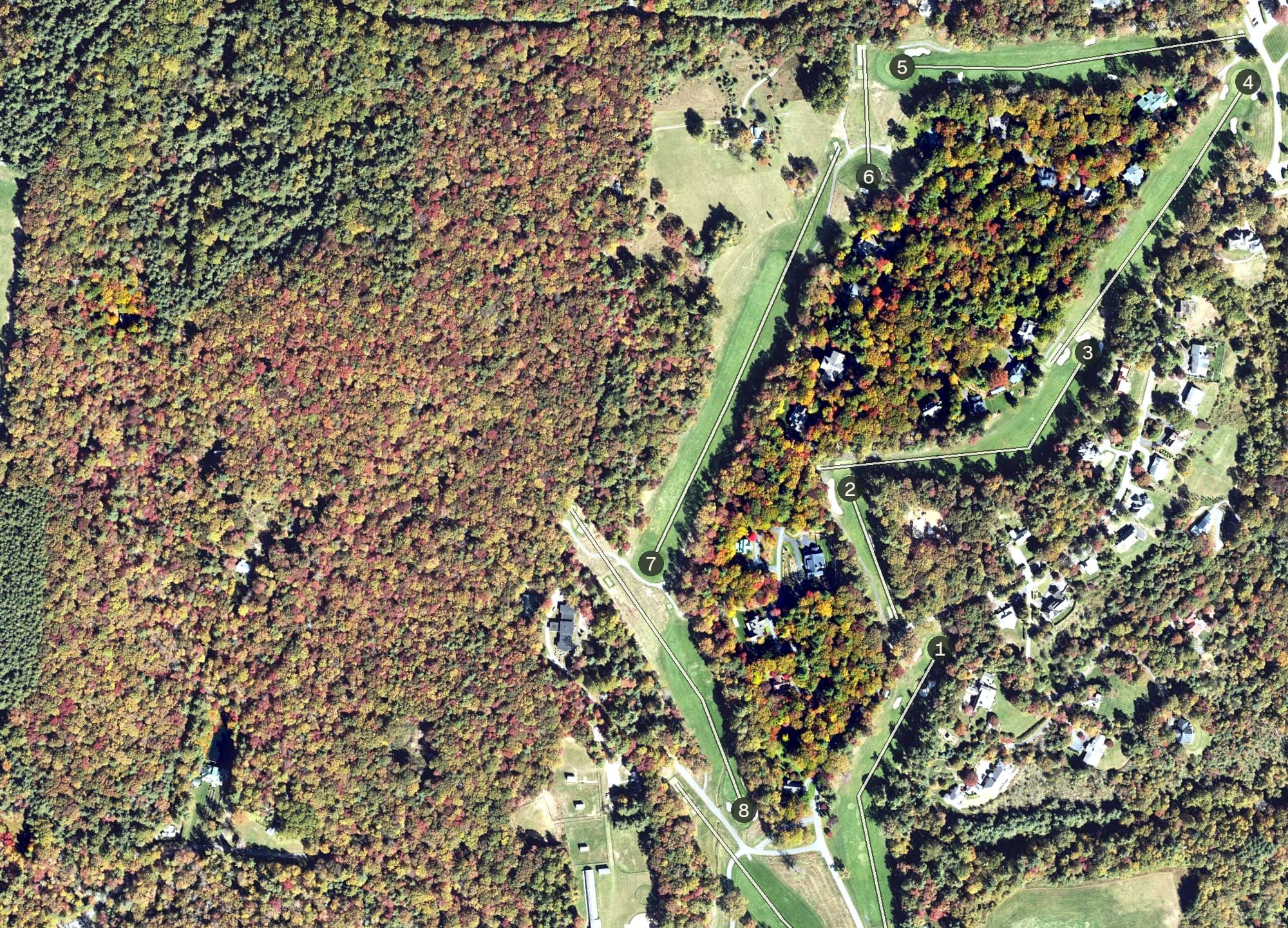 Aerial view of Roaring Gap Club, NC, with its hole routing marked