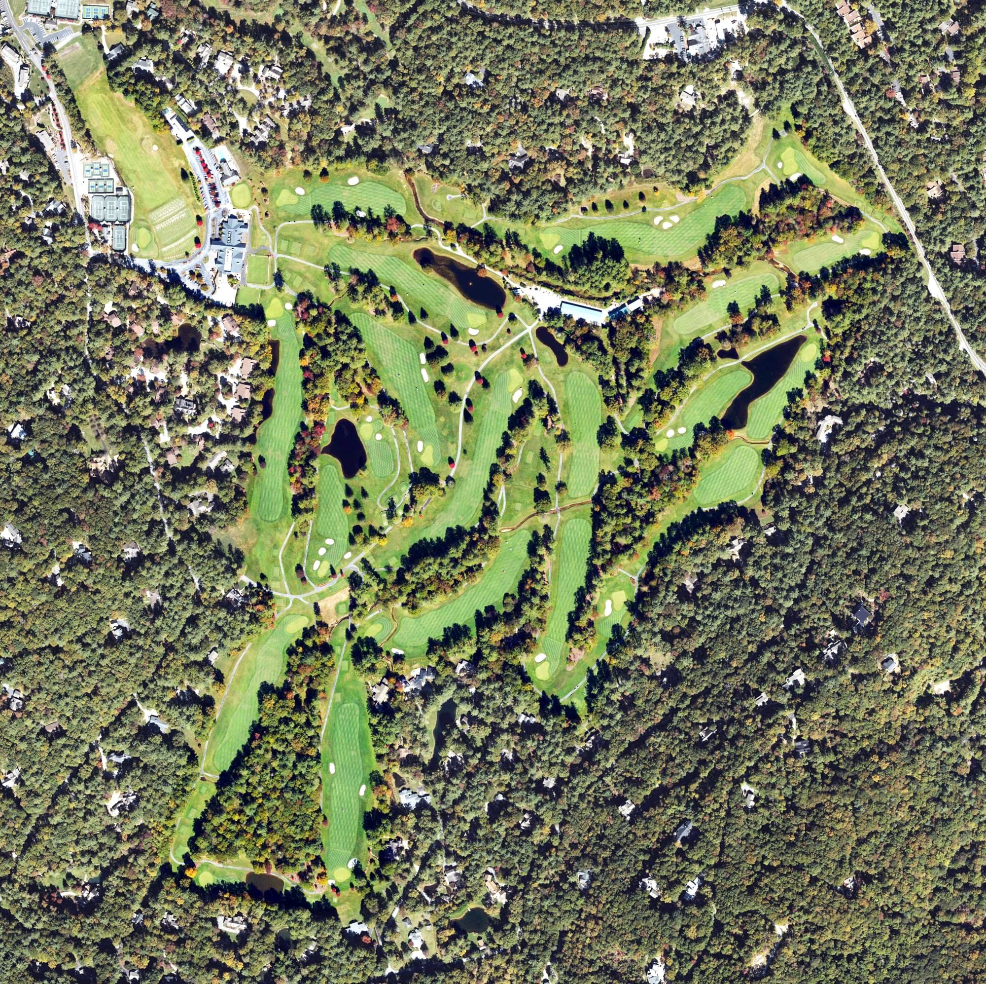 Aerial view of The Country Club of Sapphire Valley, NC, with its hole routing marked