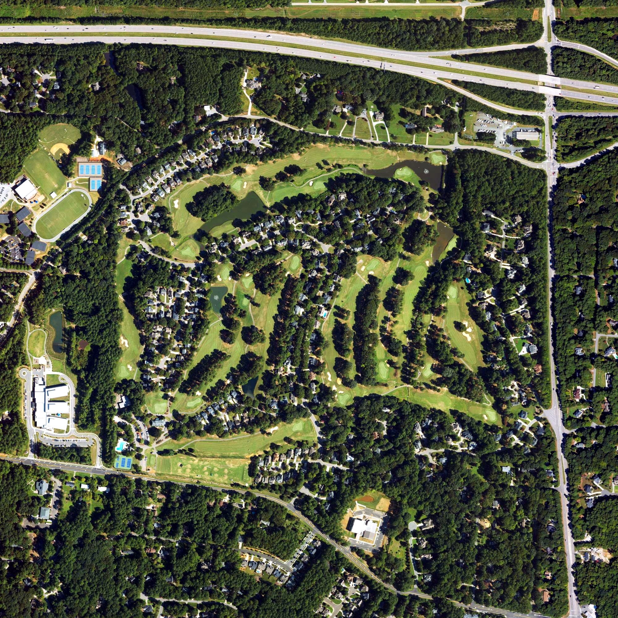 Aerial view of Wildwood Green Golf Club, NC, with its hole routing marked