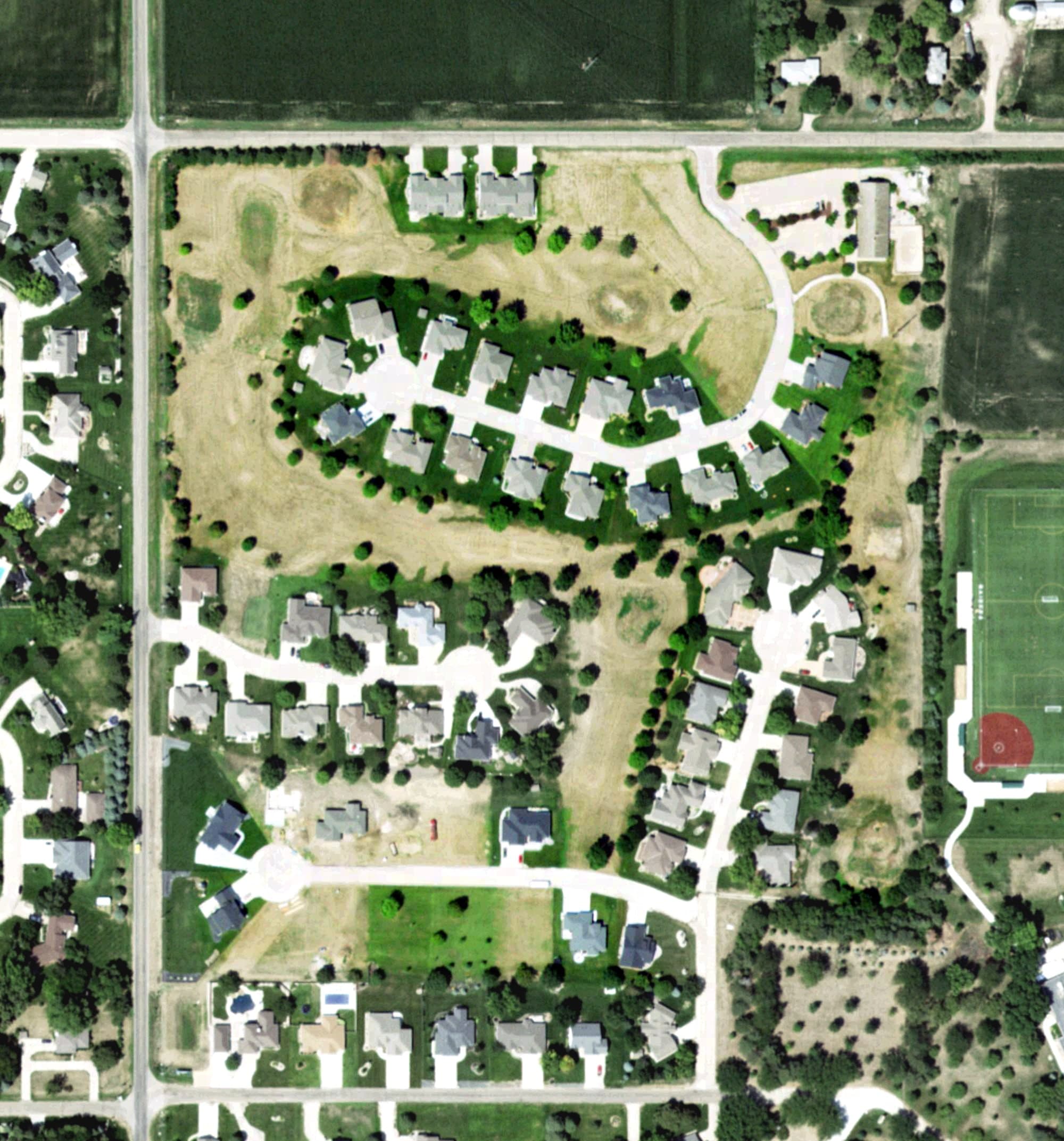 Aerial view of Country Shadows Golf Course, NE, with its hole routing marked