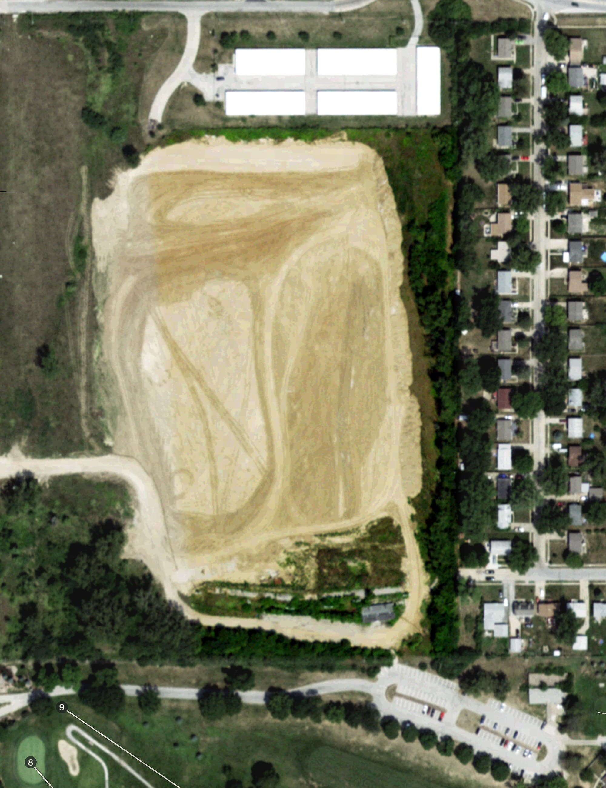 Aerial view of Driving Range, NE, with its hole routing marked