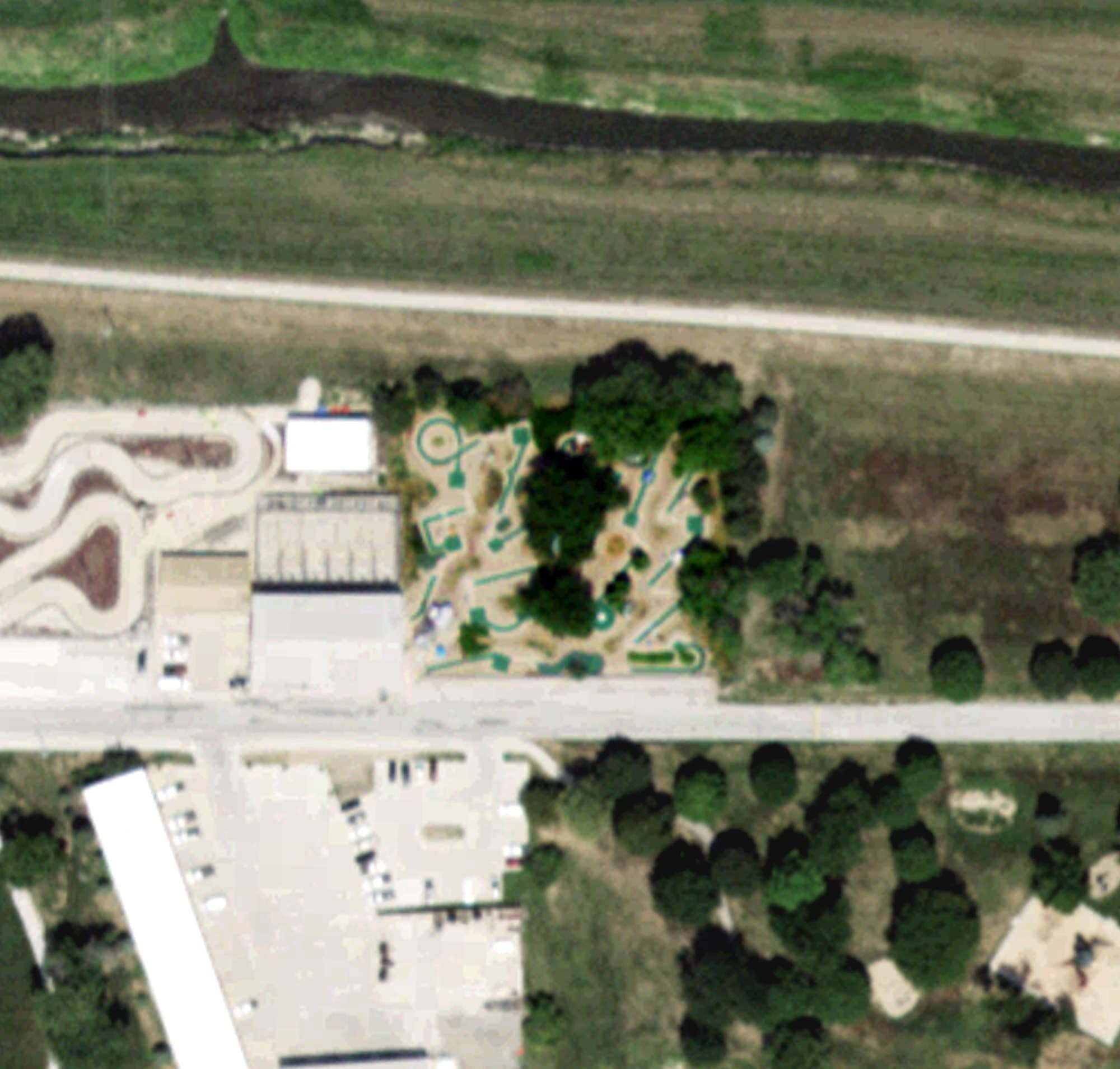 Aerial view of Mini Golf, NE, with its hole routing marked