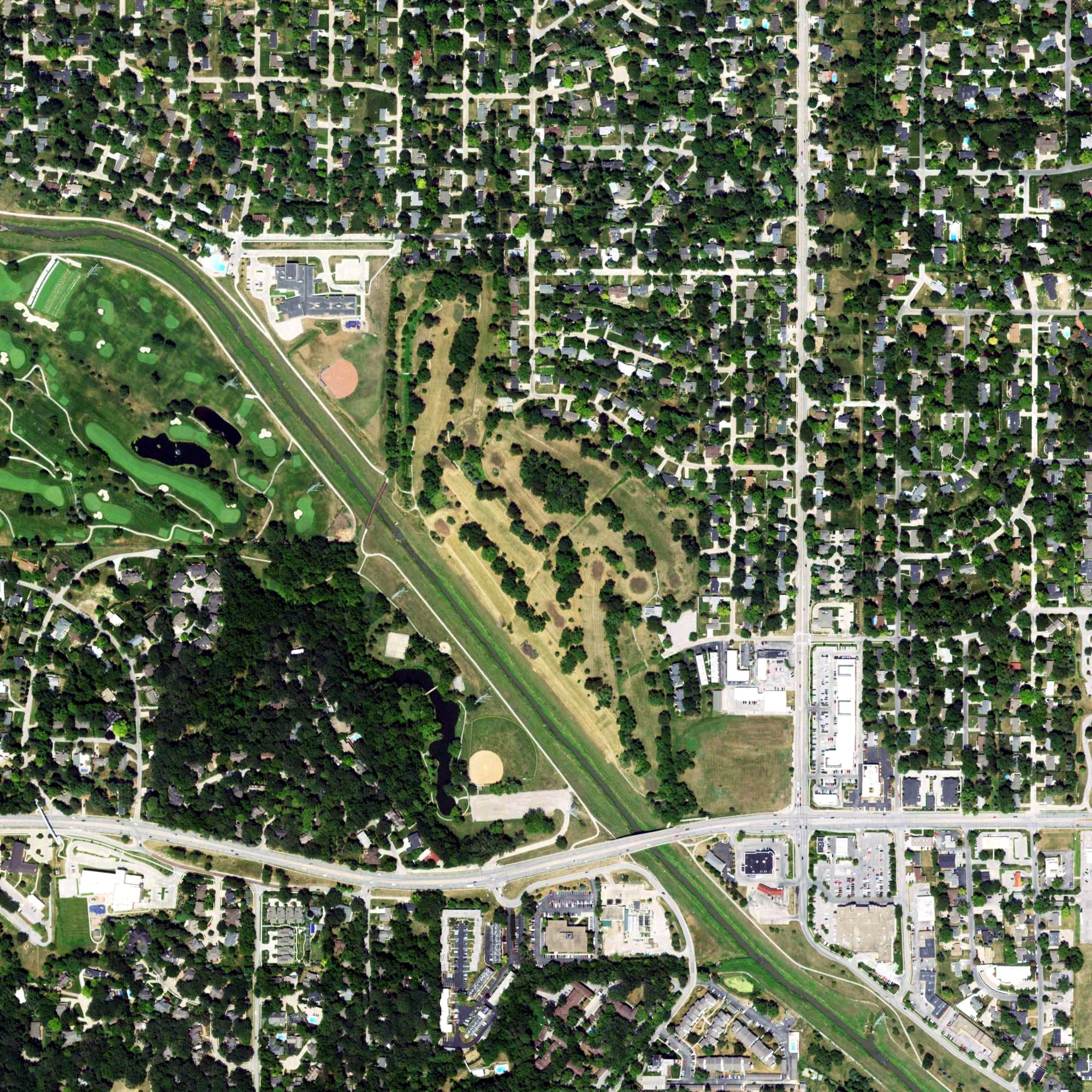 Aerial view of Sunset Valley Country Club, NE, with its hole routing marked