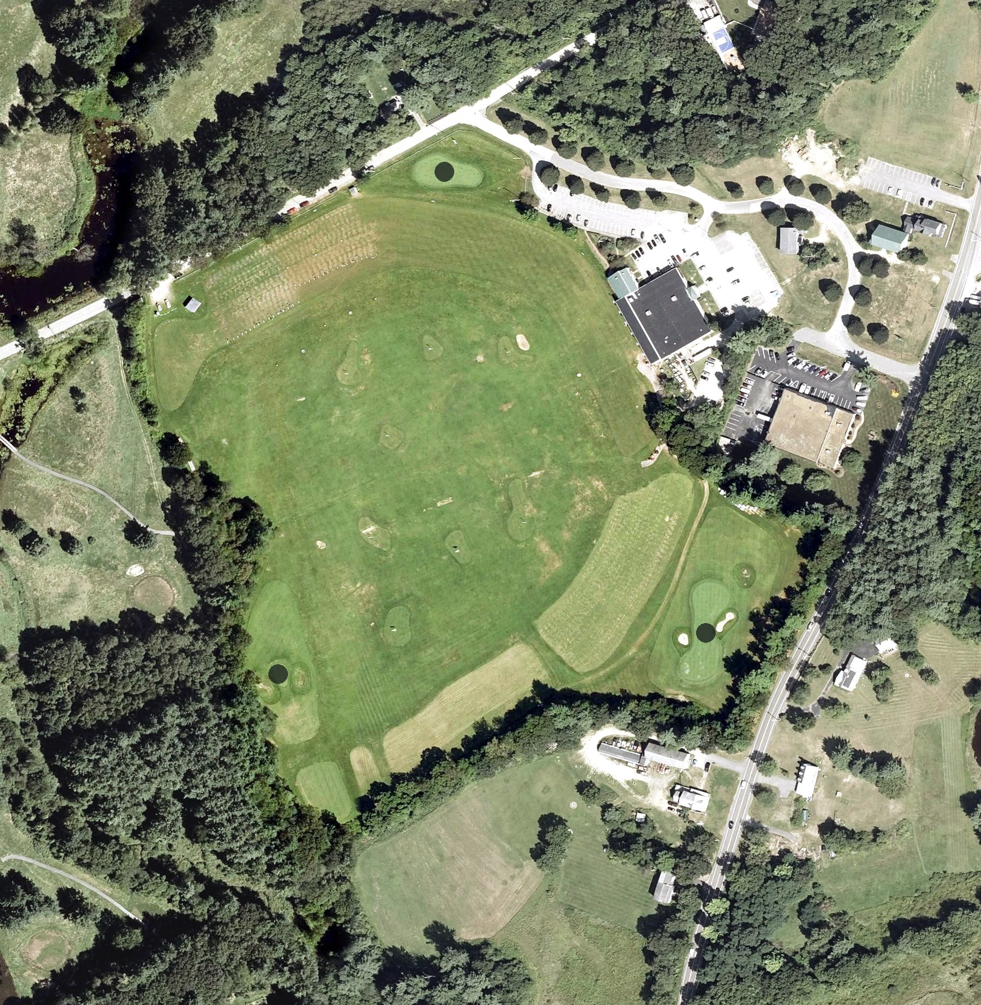 Aerial view of World Cup Golf Center, NH, with its hole routing marked