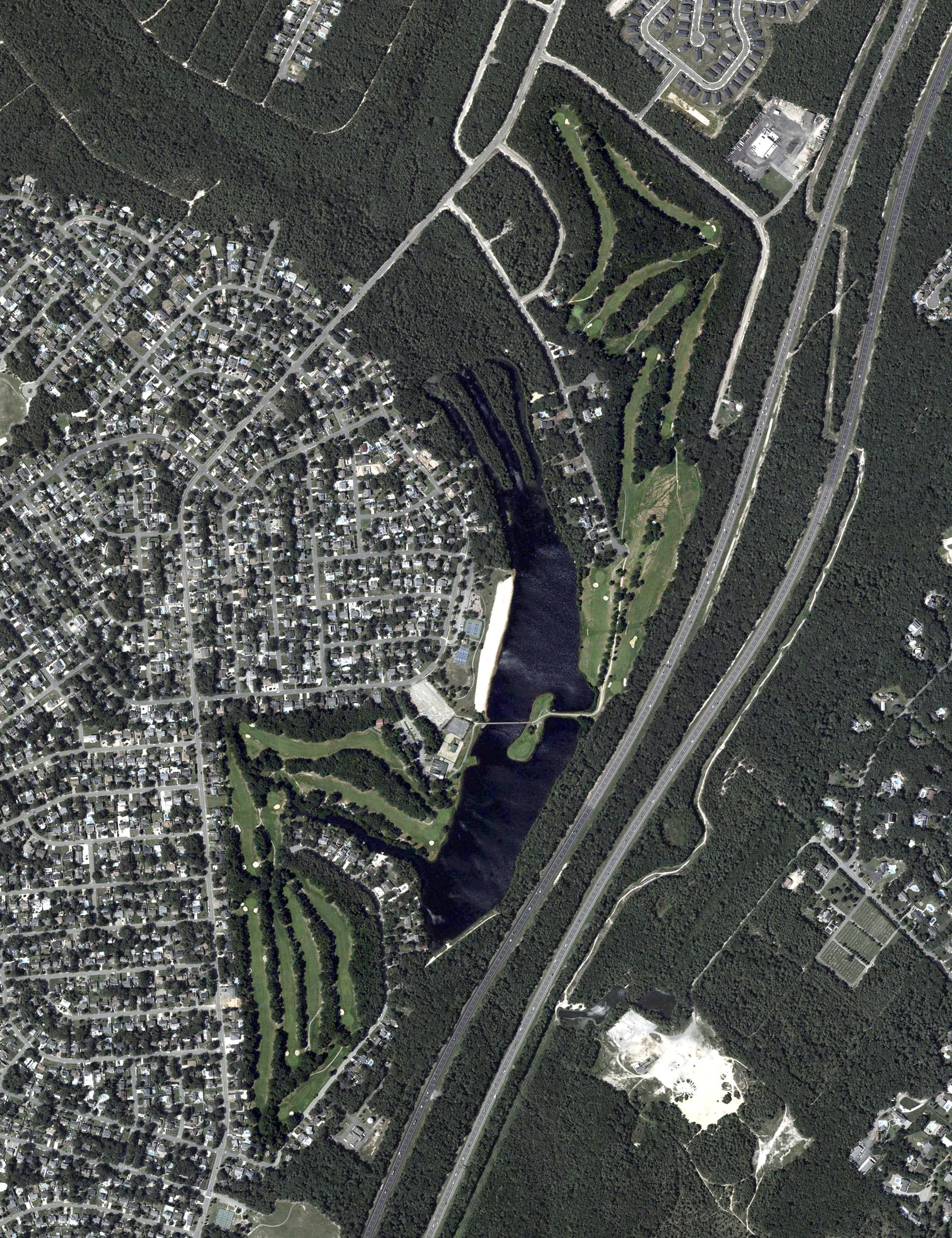 Aerial view of Ocean Acres Country Club, NJ, with its hole routing marked