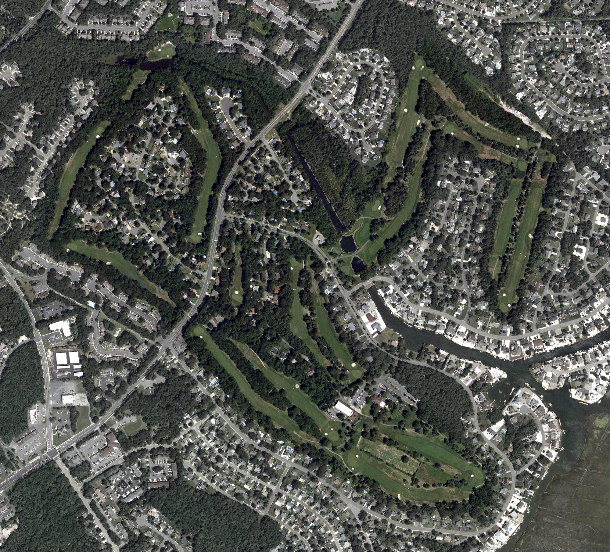 Aerial view of Ocean County Golf Course at Atlantis, NJ, with its hole routing marked