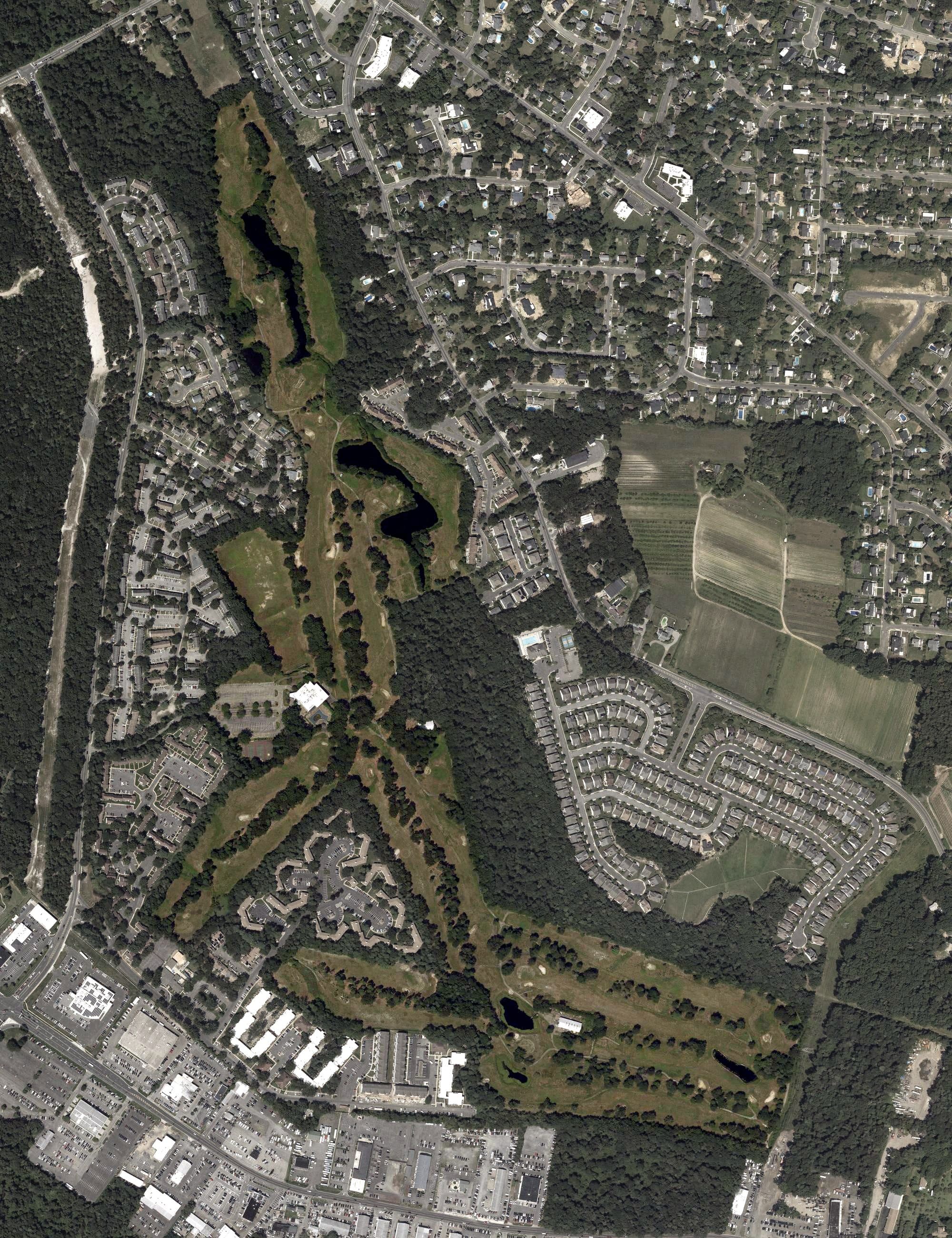 Aerial view of Woodlake Country Club, NJ, with its hole routing marked