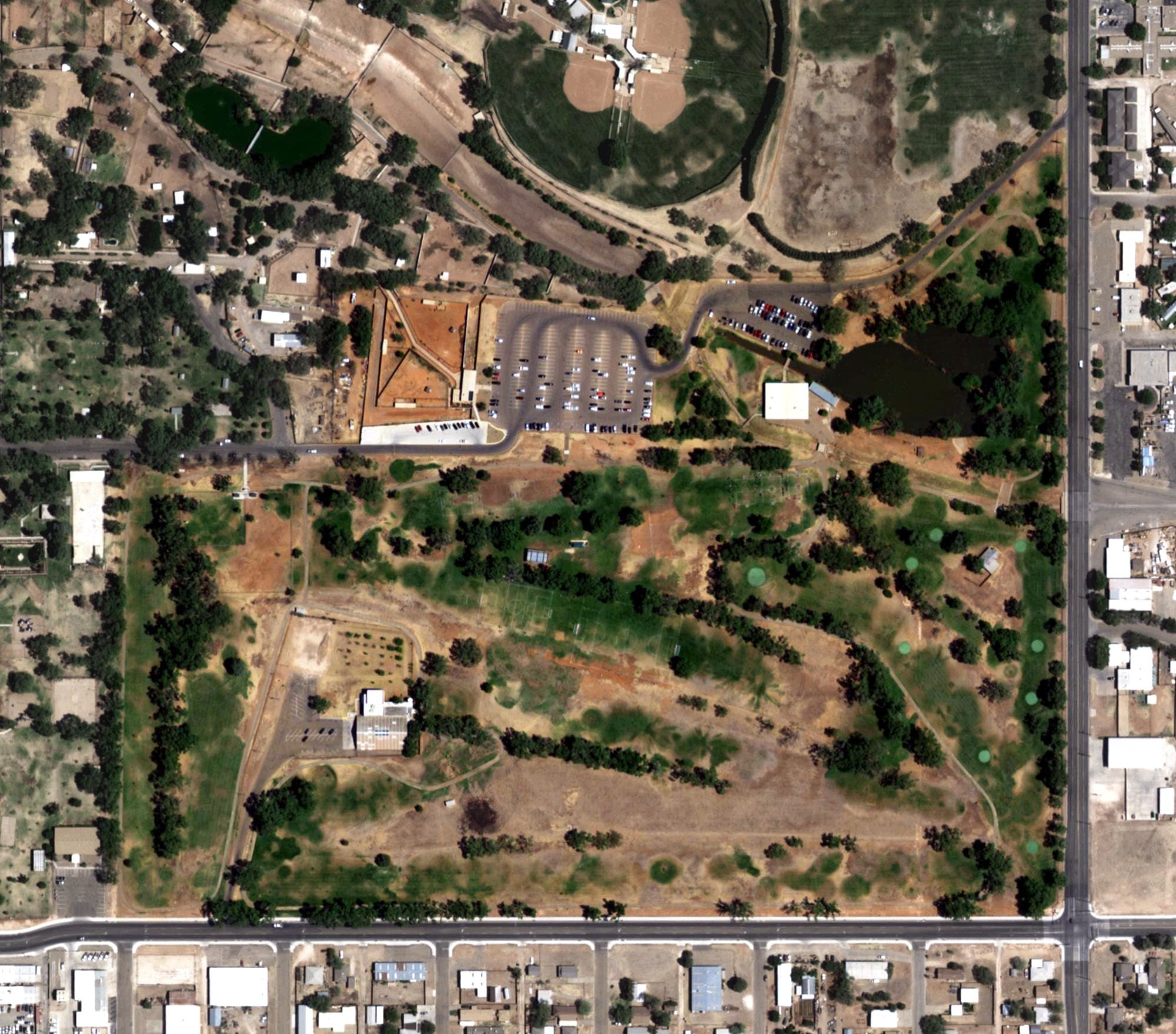 Aerial view of Colonial Park Golf Course, NM, with its hole routing marked