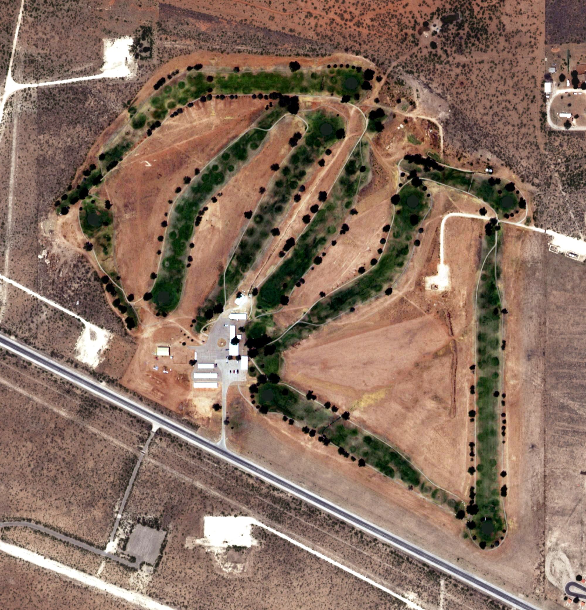 Aerial view of Eunice Golf Course, NM, with its hole routing marked