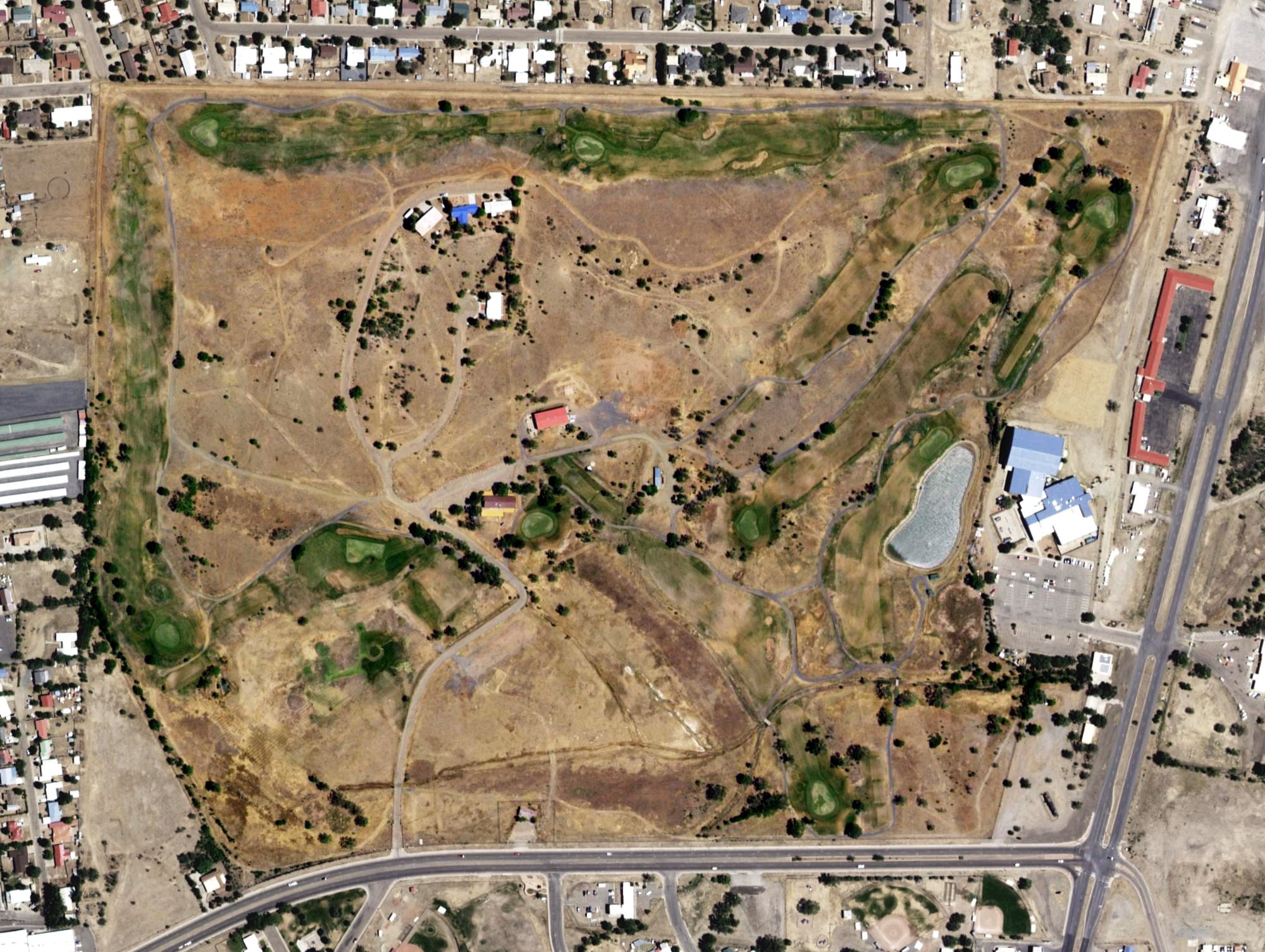 Aerial view of Gene Torres Golf Course, NM, with its hole routing marked