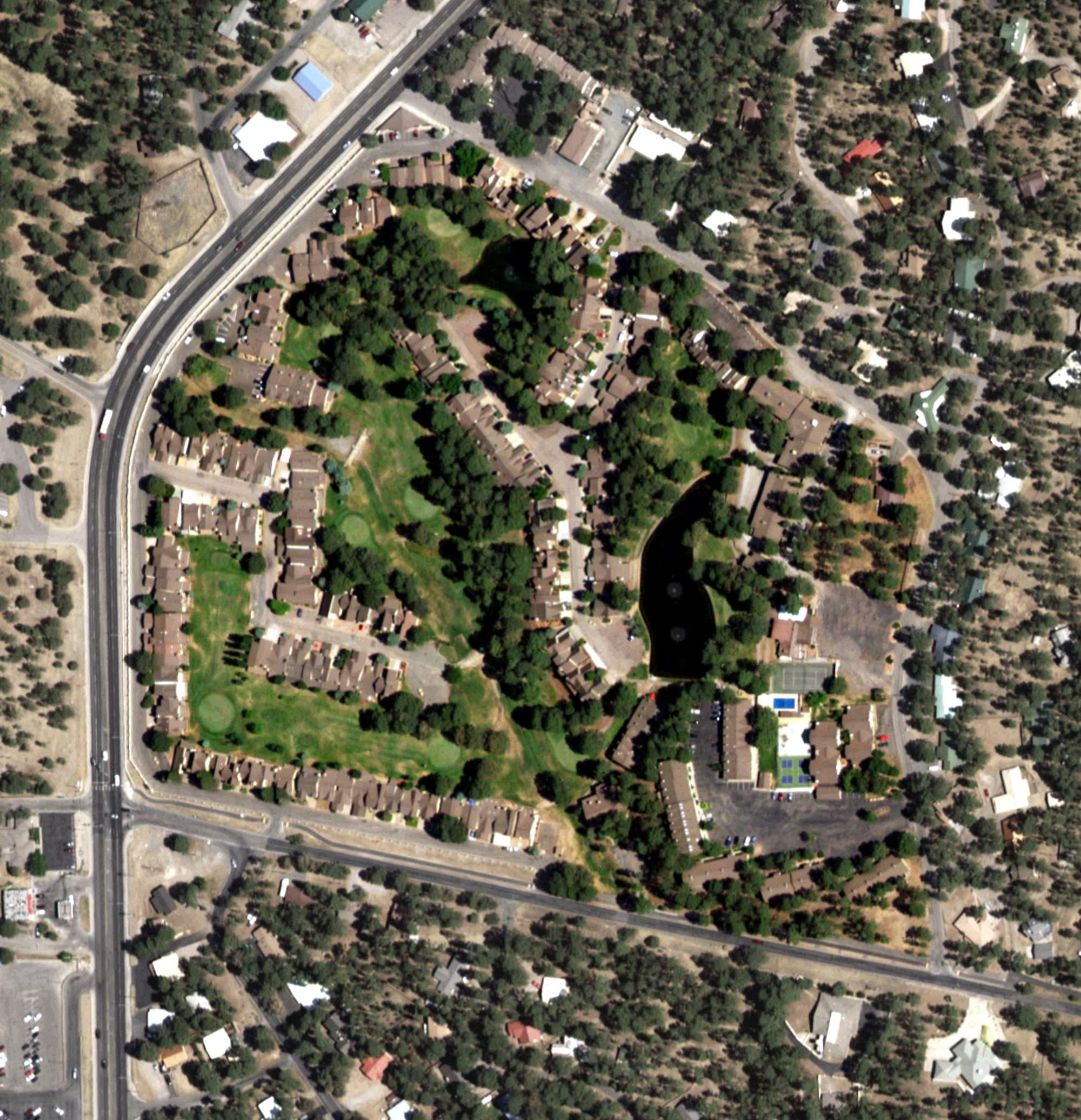 Aerial view of Innsbrook Village Country Club, NM, with its hole routing marked