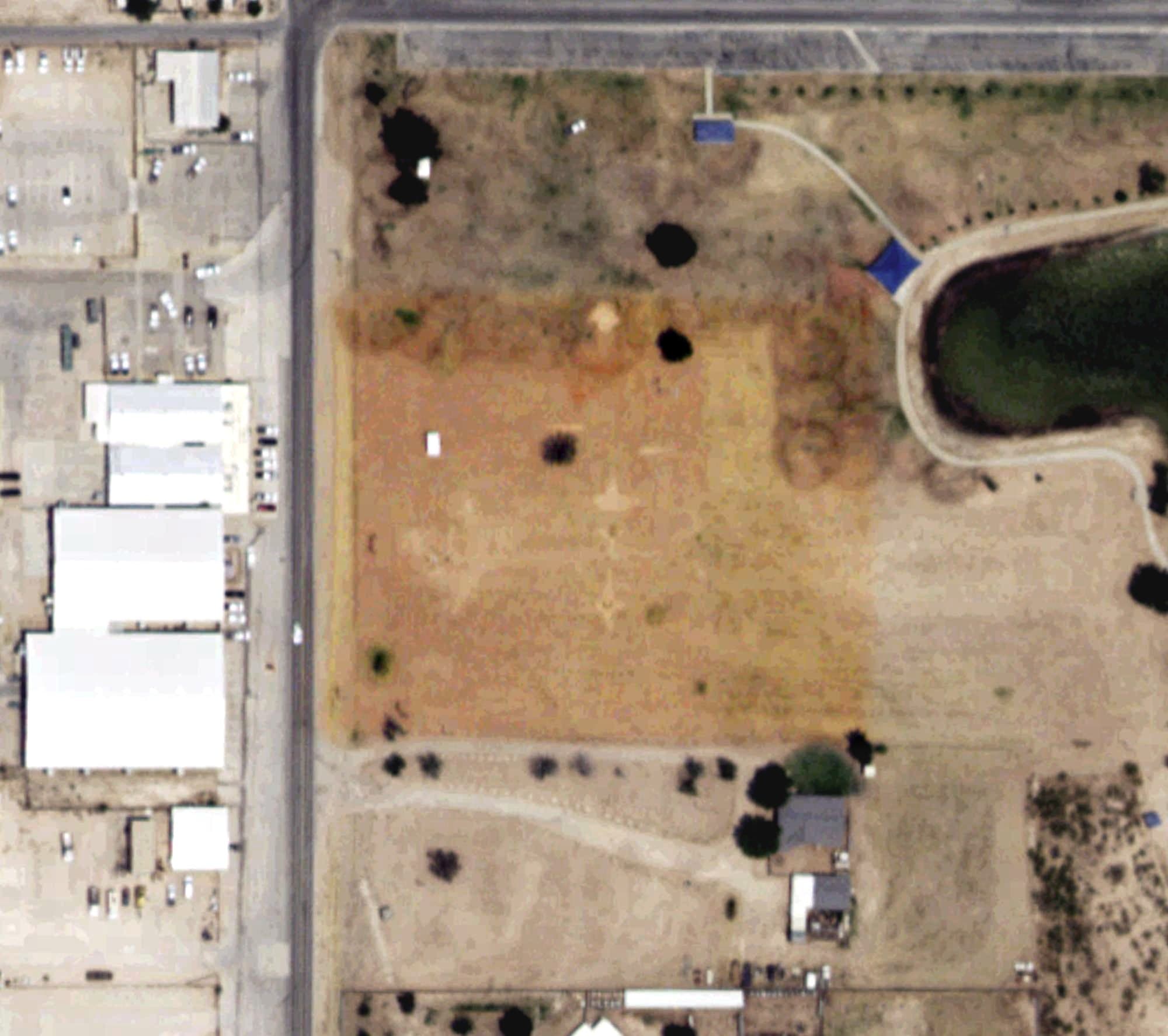 Aerial view of Jal Lake Practice Golf Course, NM, with its hole routing marked