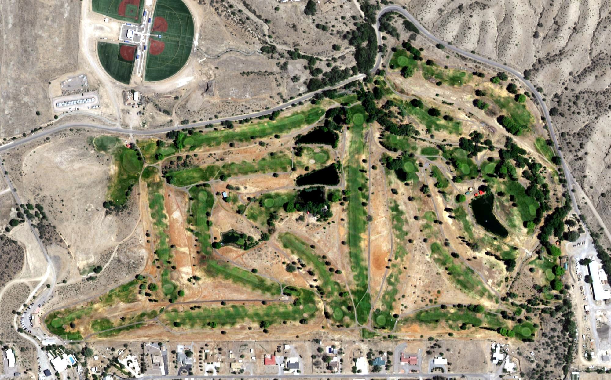 Aerial view of Silver City Golf Course, NM, with its hole routing marked