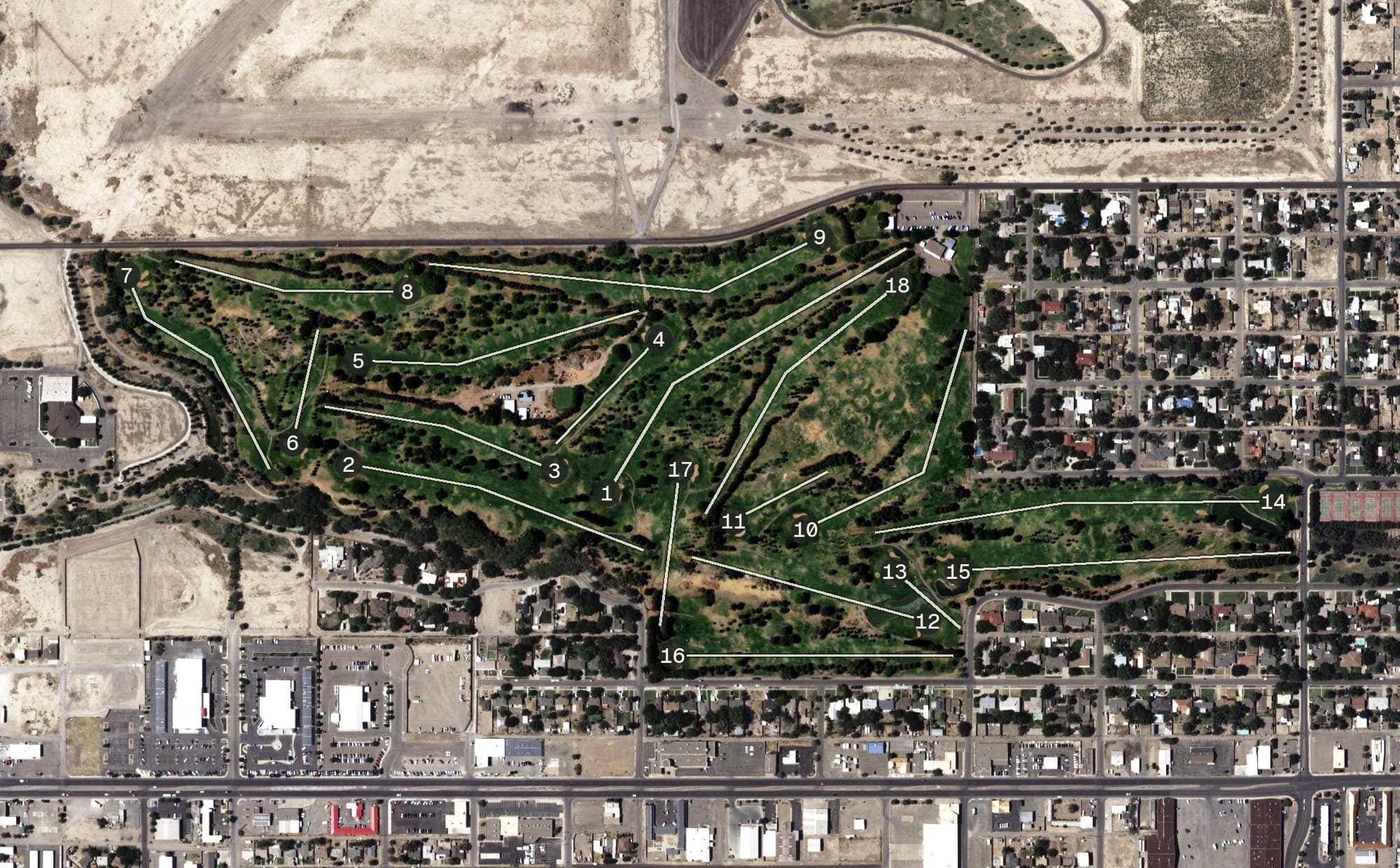 Aerial view of Spring River Golf Course, NM, with its hole routing marked