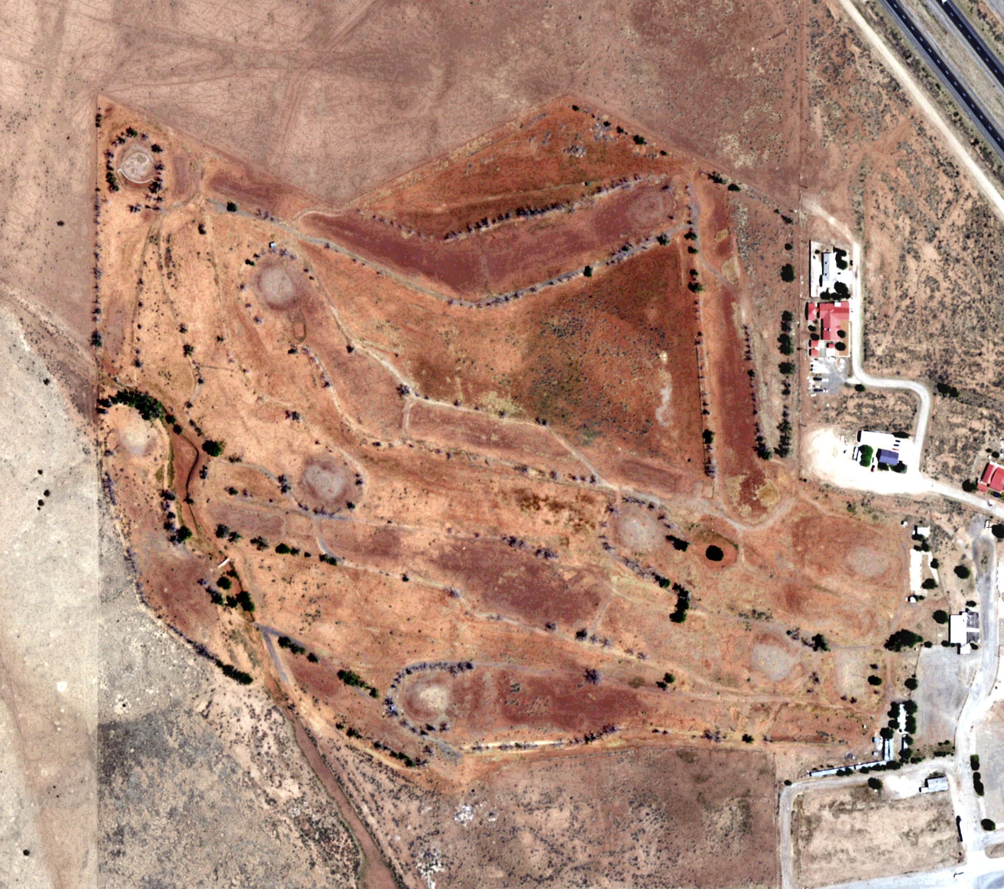 Aerial view of Zuni Mountain Golf Course, NM, with its hole routing marked