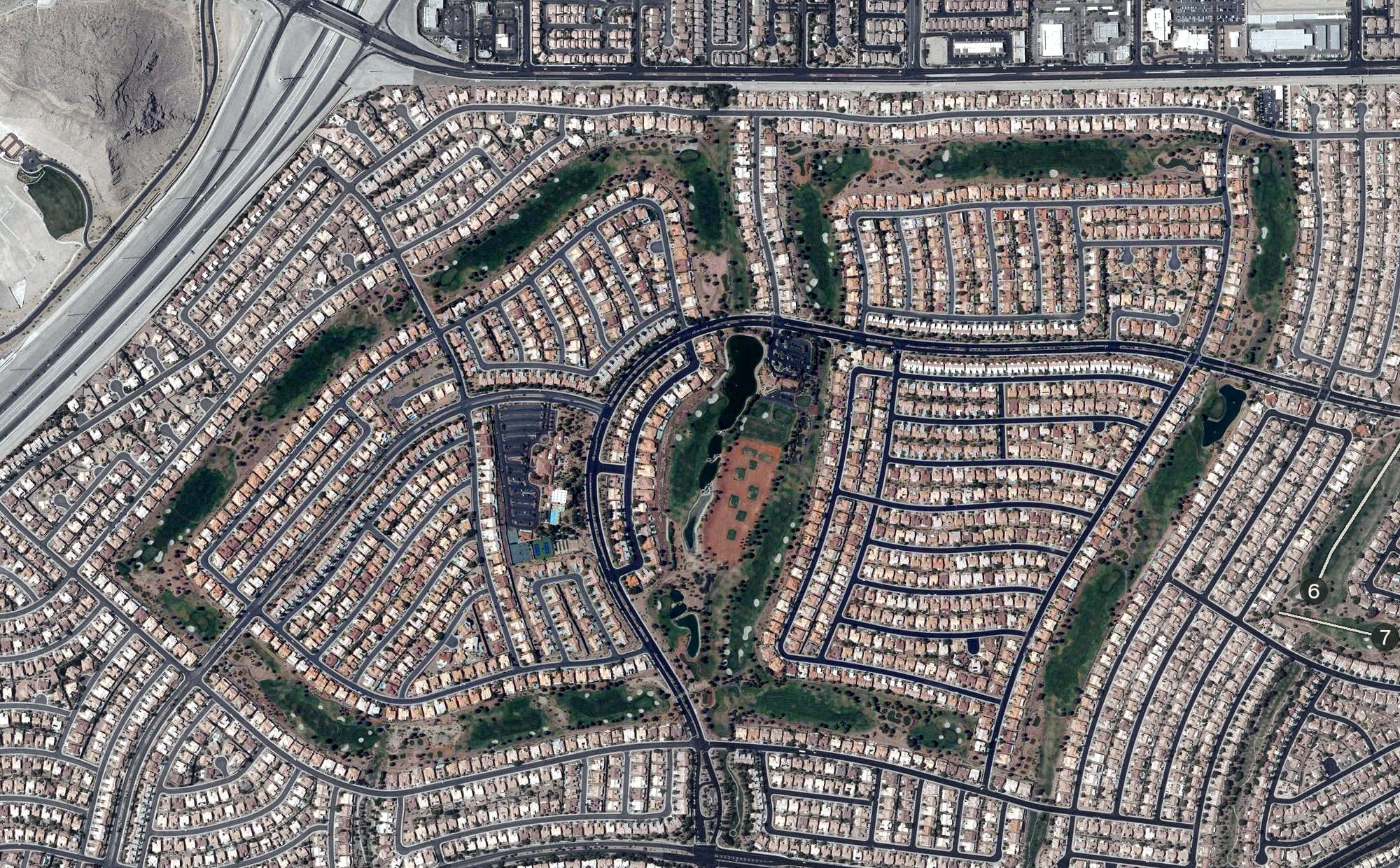 Aerial view of Highland Falls Golf Course, NV, with its hole routing marked