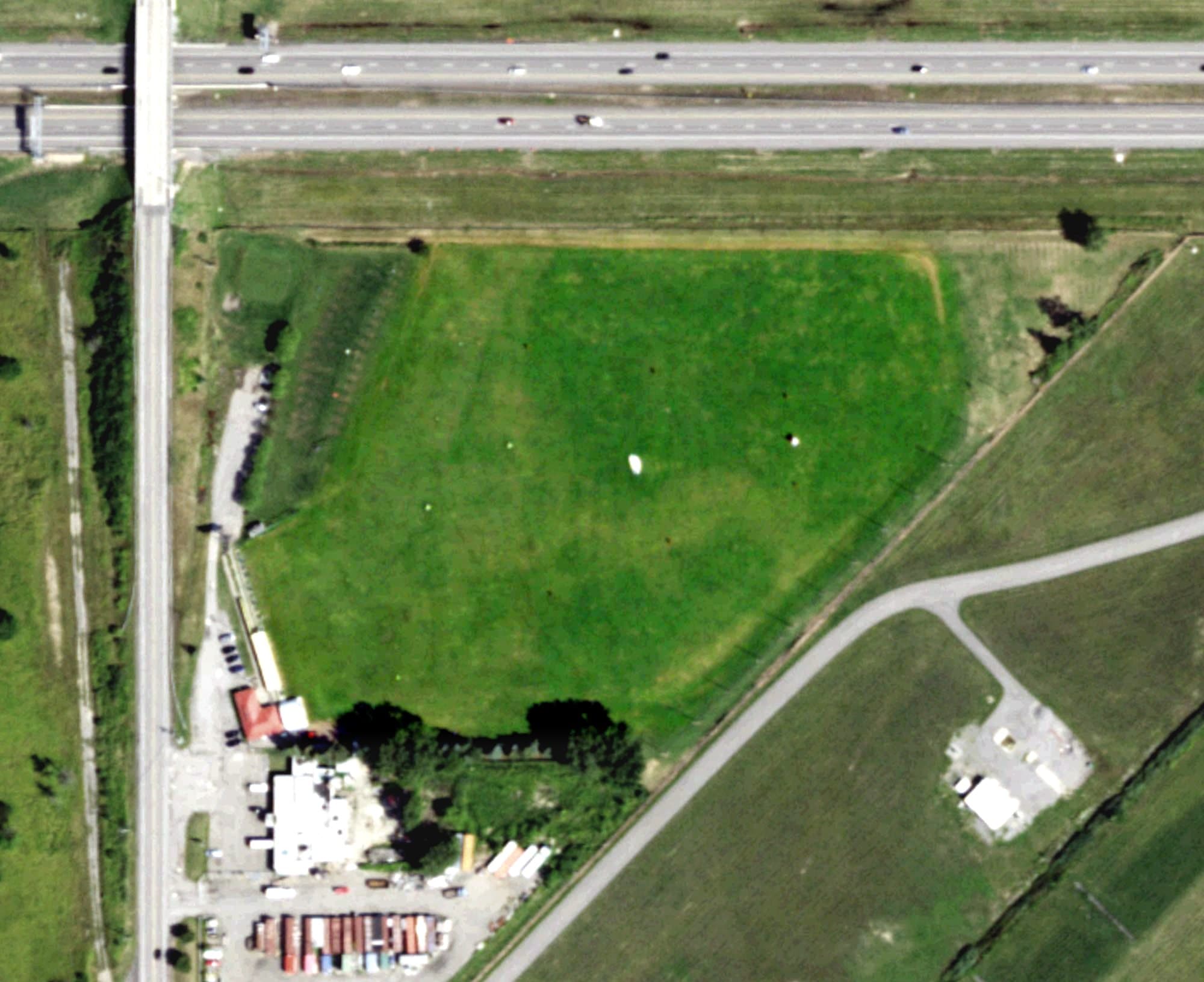 Aerial view of Airport Driving Range, NY, with its hole routing marked