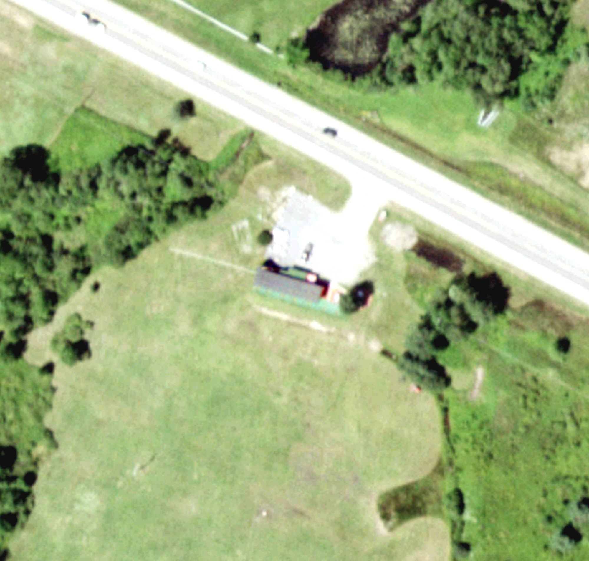 Aerial view of Driving Range Main Building, NY, with its hole routing marked