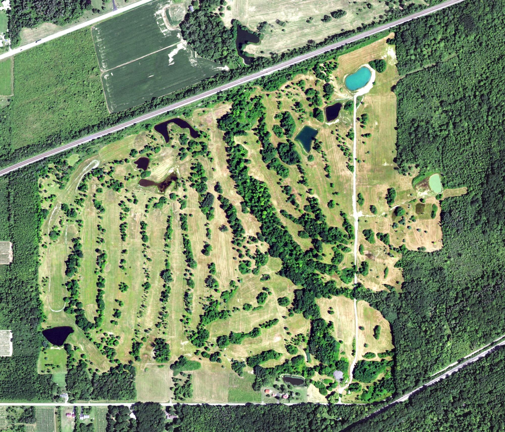 Aerial view of Eagle Bay Golf Course, NY, with its hole routing marked