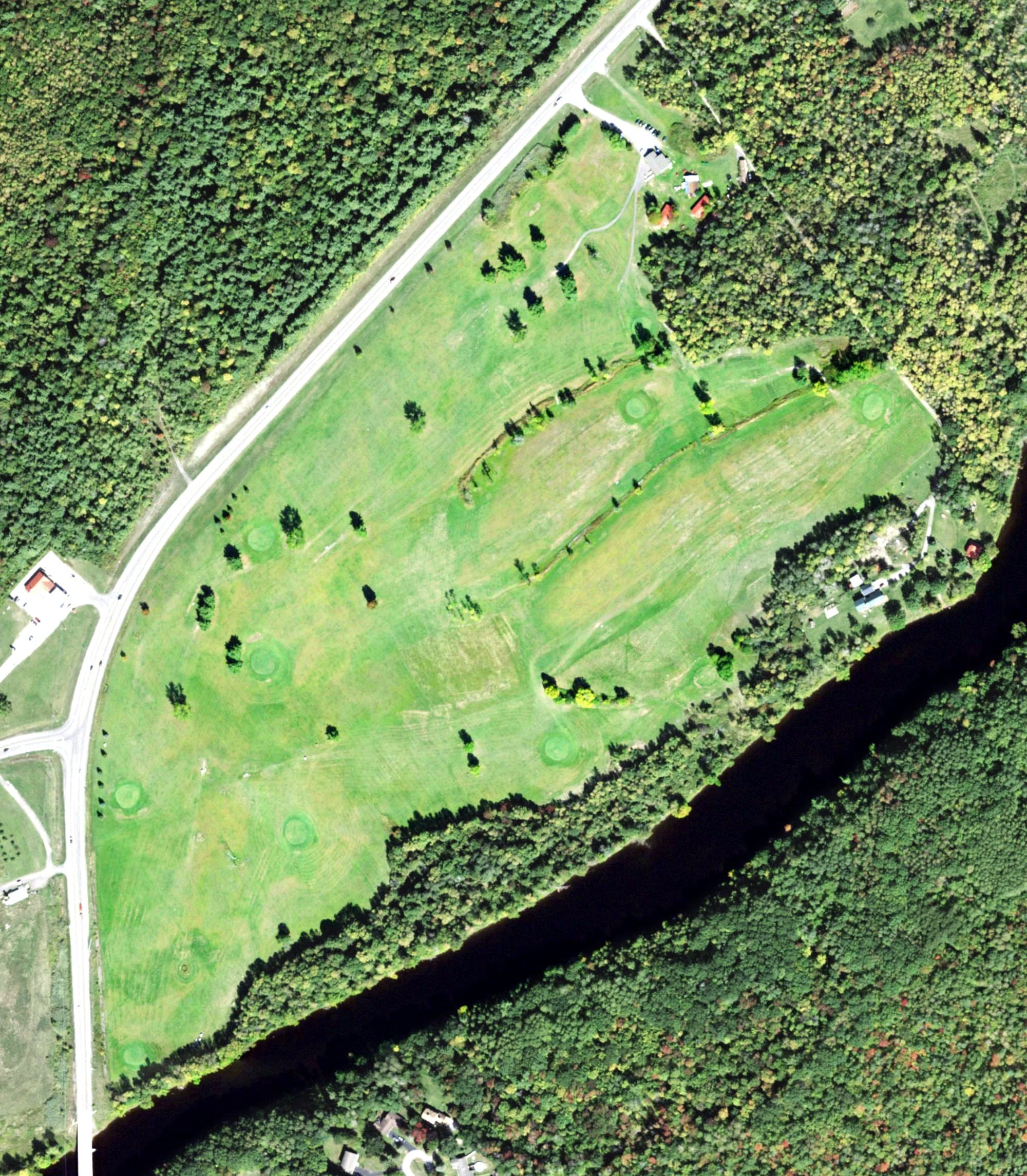 Aerial view of Raymondville Golf and Country Club, NY, with its hole routing marked