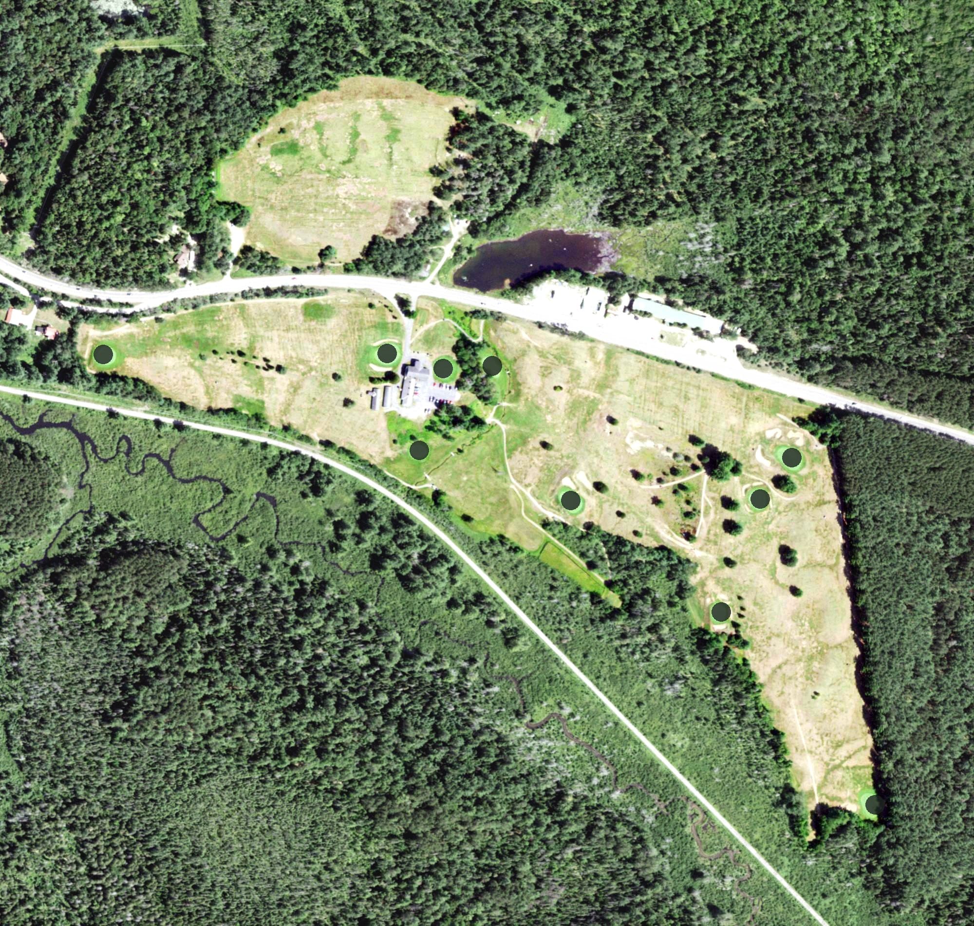 Aerial view of Saranac Lake Golf Course, NY, with its hole routing marked