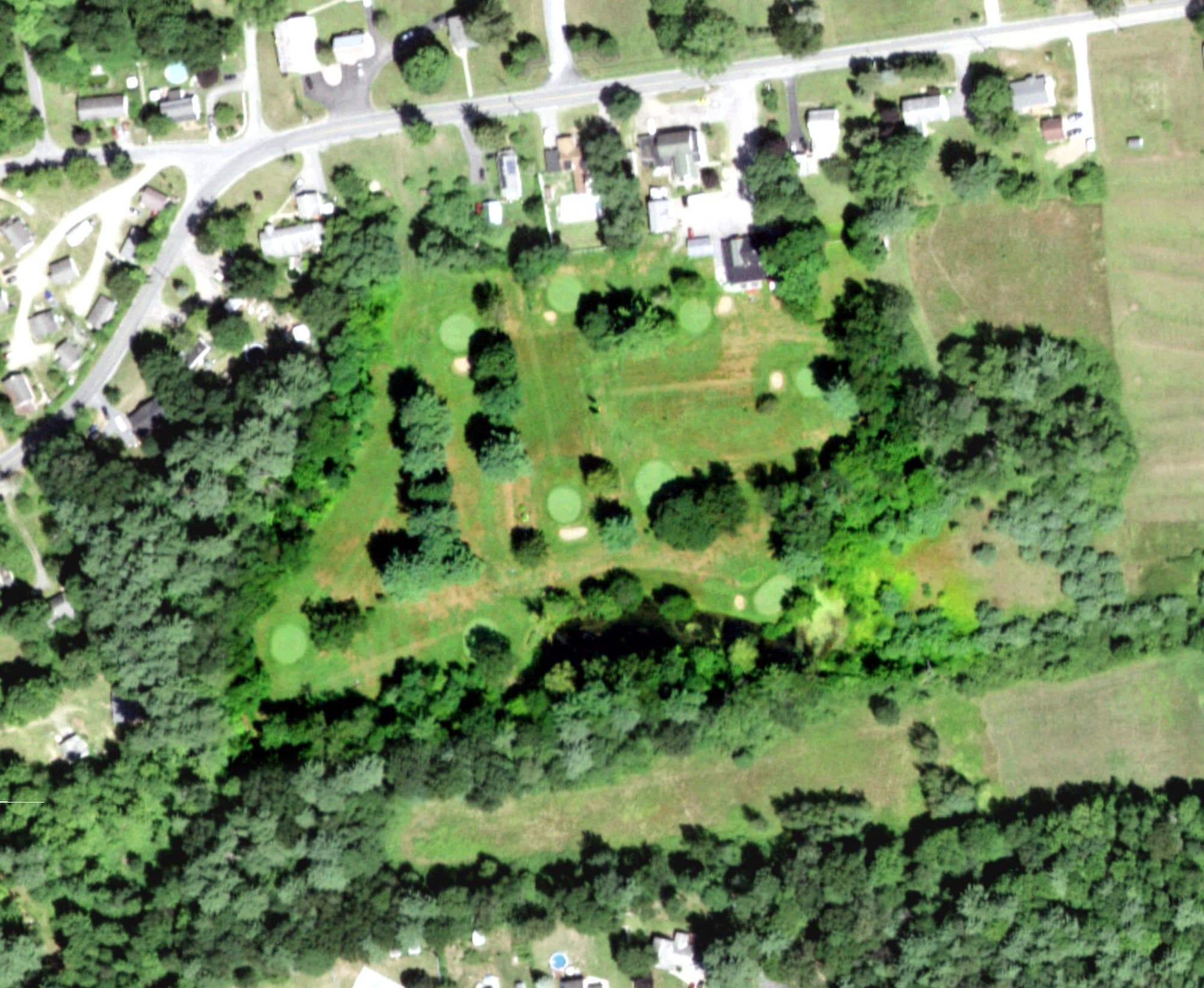 Aerial view of Sunnyside Par 3 Golf Course, NY, with its hole routing marked
