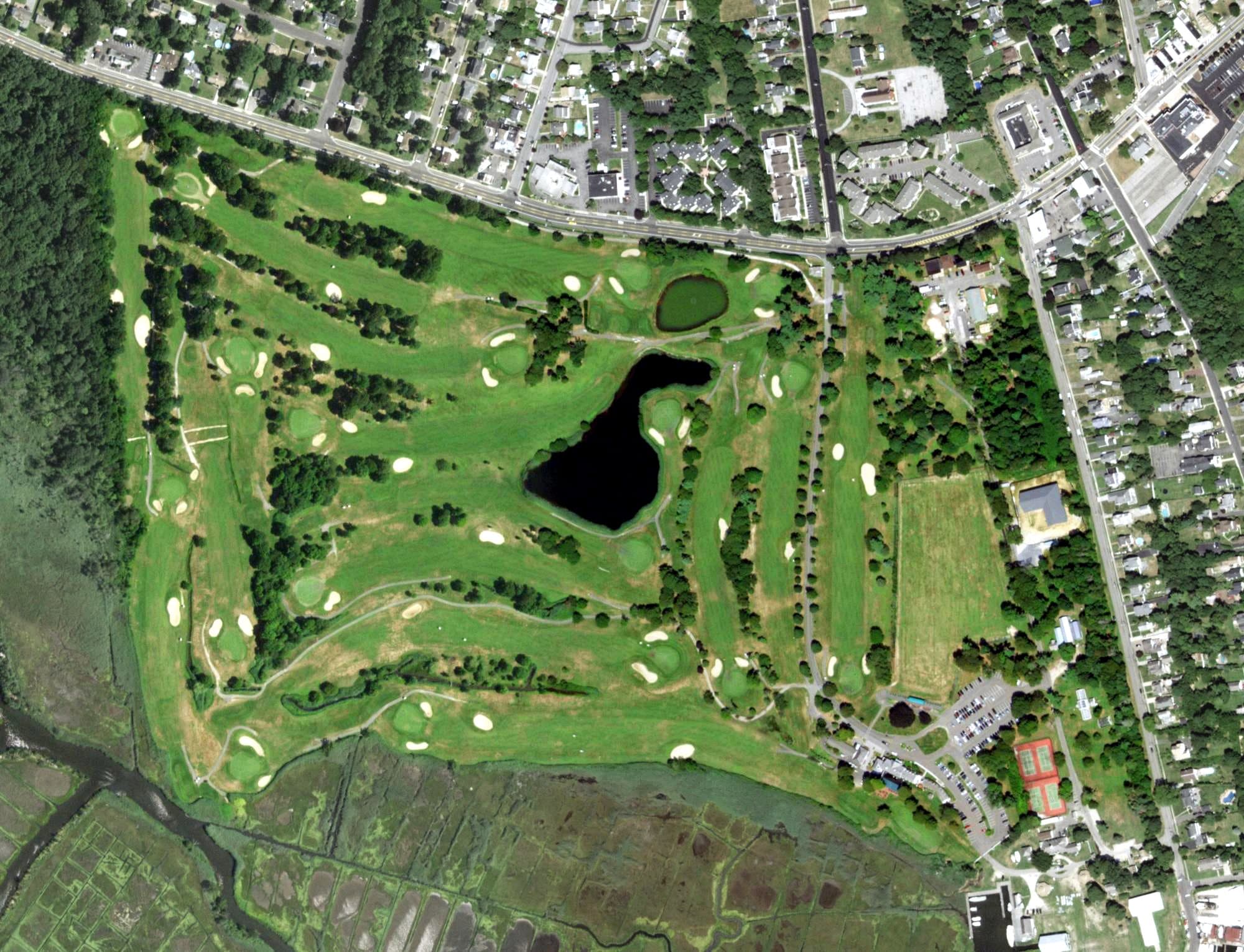 Aerial view of West Sayville Golf Course, NY, with its hole routing marked