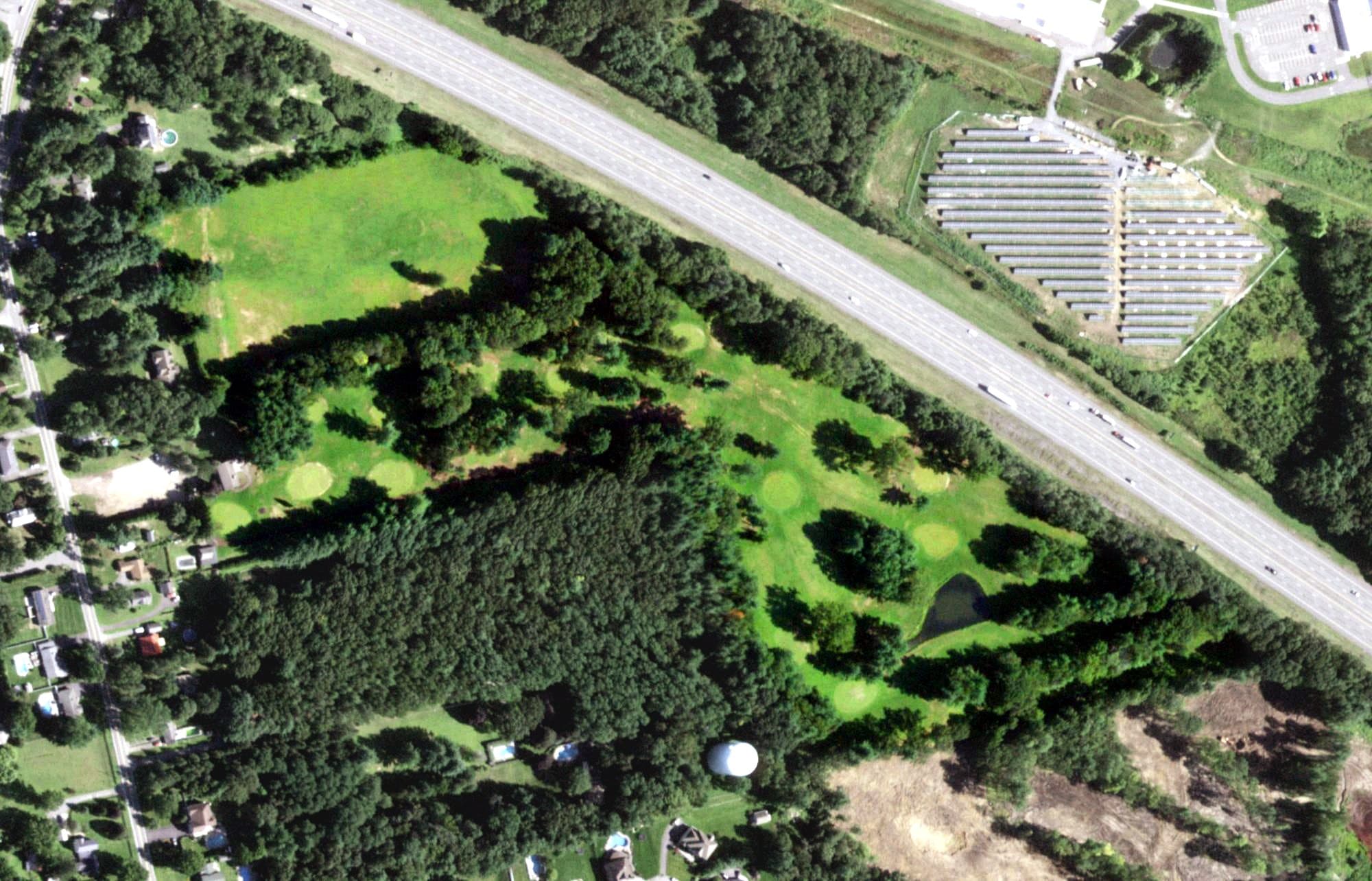 Aerial view of Whispering Pines Golf Course, NY, with its hole routing marked