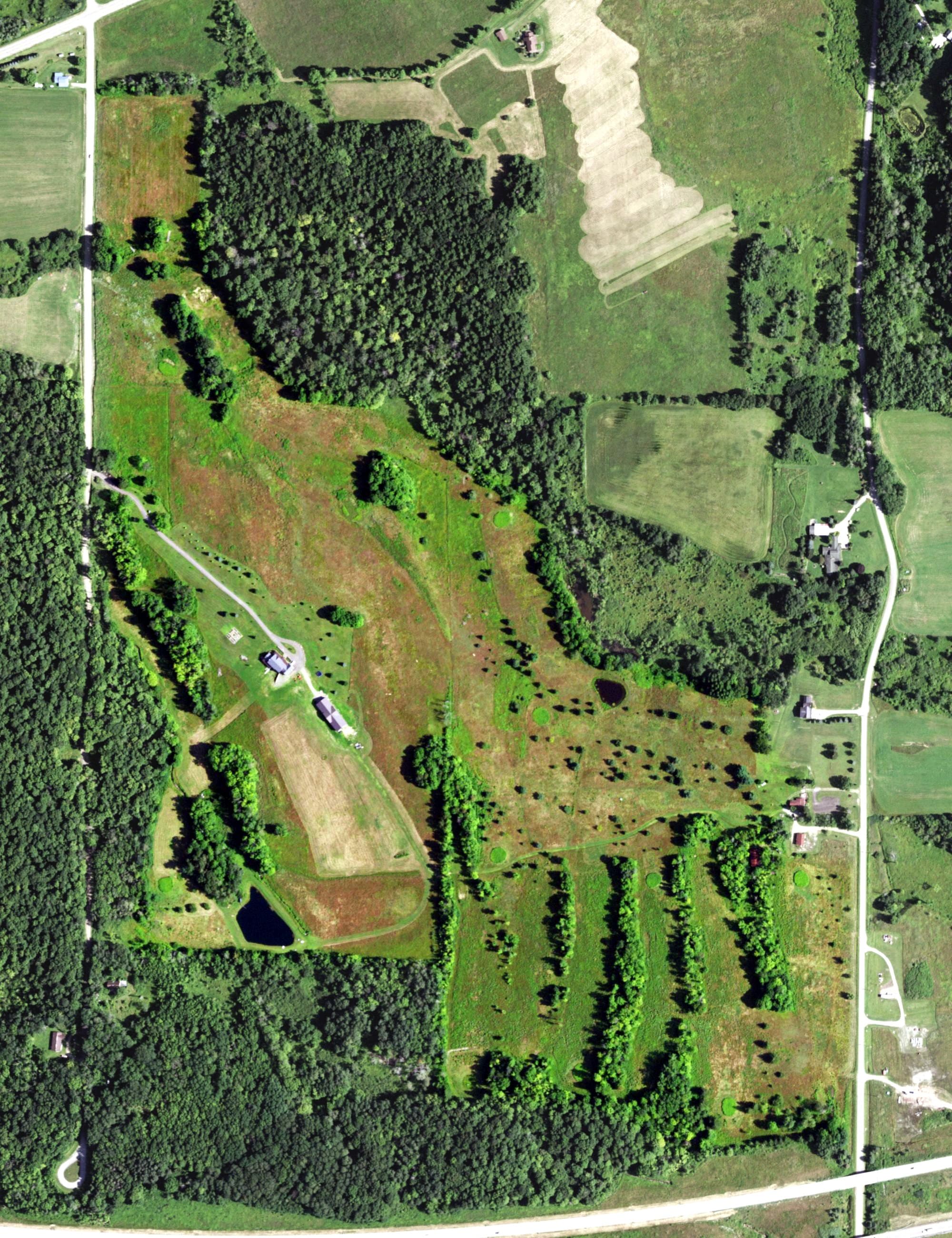 Aerial view of Woodcrest Golf Club, NY, with its hole routing marked