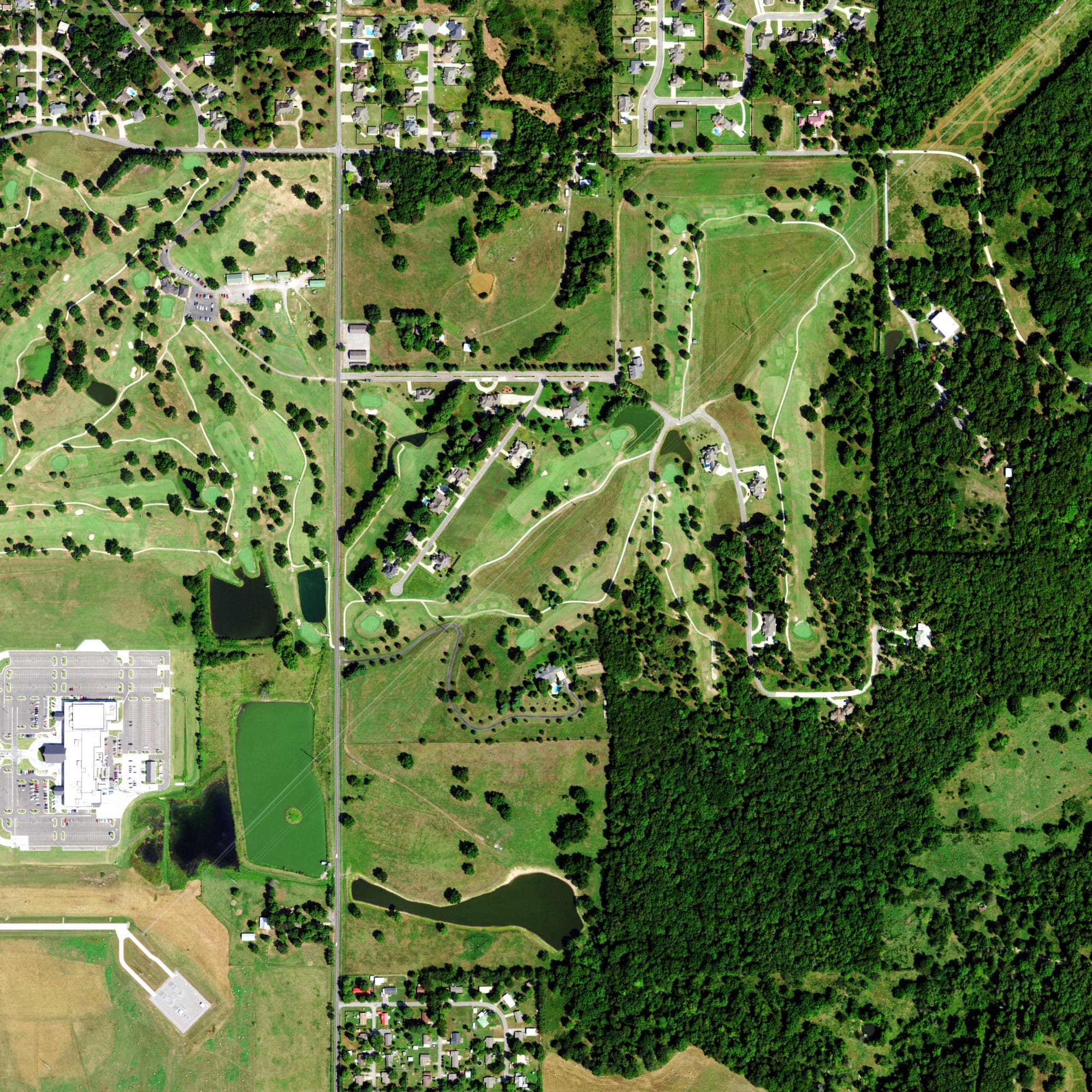 Aerial view of Cherokee Springs Golf Club, OK, with its hole routing marked