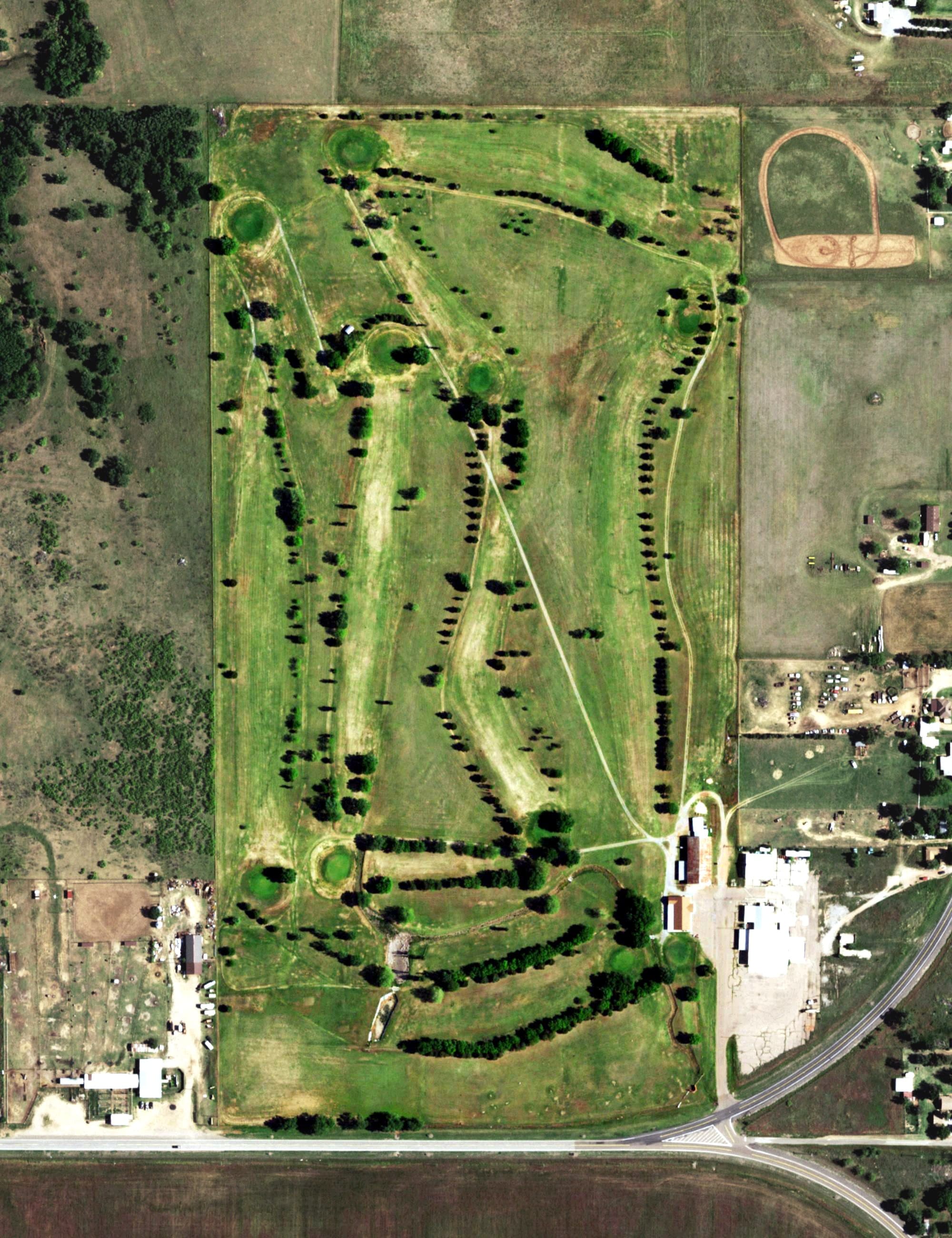 Aerial view of Mangum Municipal Golf Course, OK, with its hole routing marked
