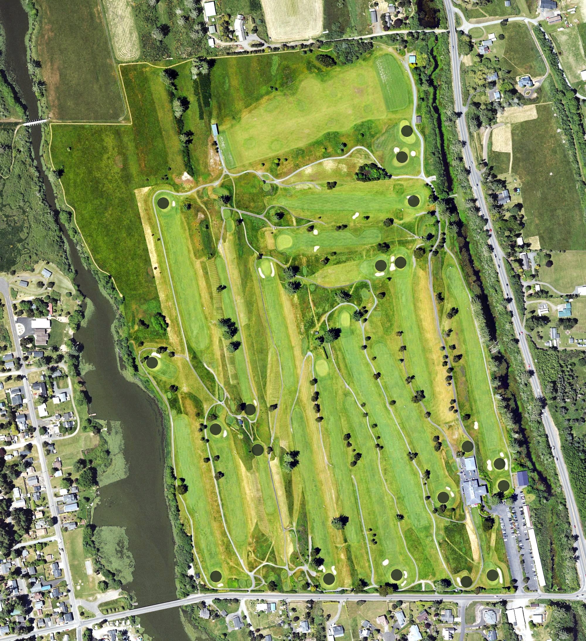 Aerial view of Astoria Golf & Country Club, OR, with its hole routing marked