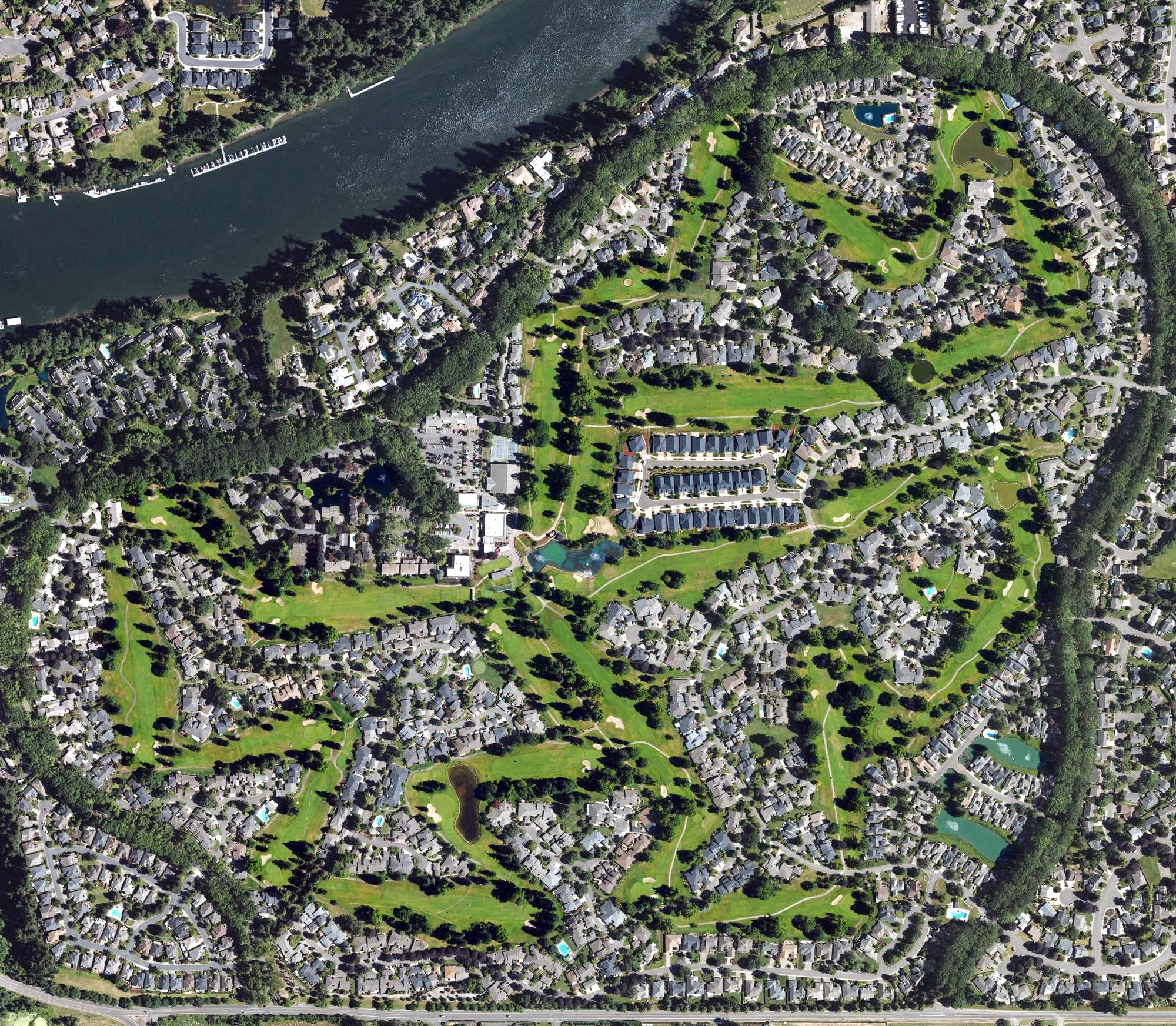 Aerial view of Charbonneau Golf Course, OR, with its hole routing marked