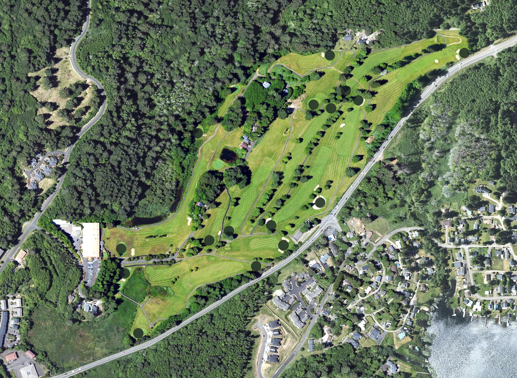 Aerial view of Chinook Winds Golf Resort, OR, with its hole routing marked
