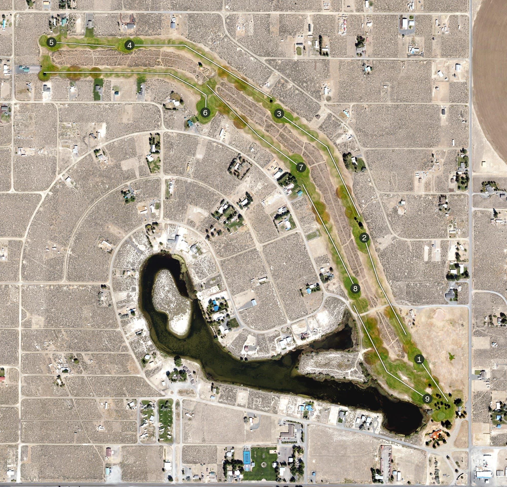 Aerial view of Christmas Valley Golf Course, OR, with its hole routing marked