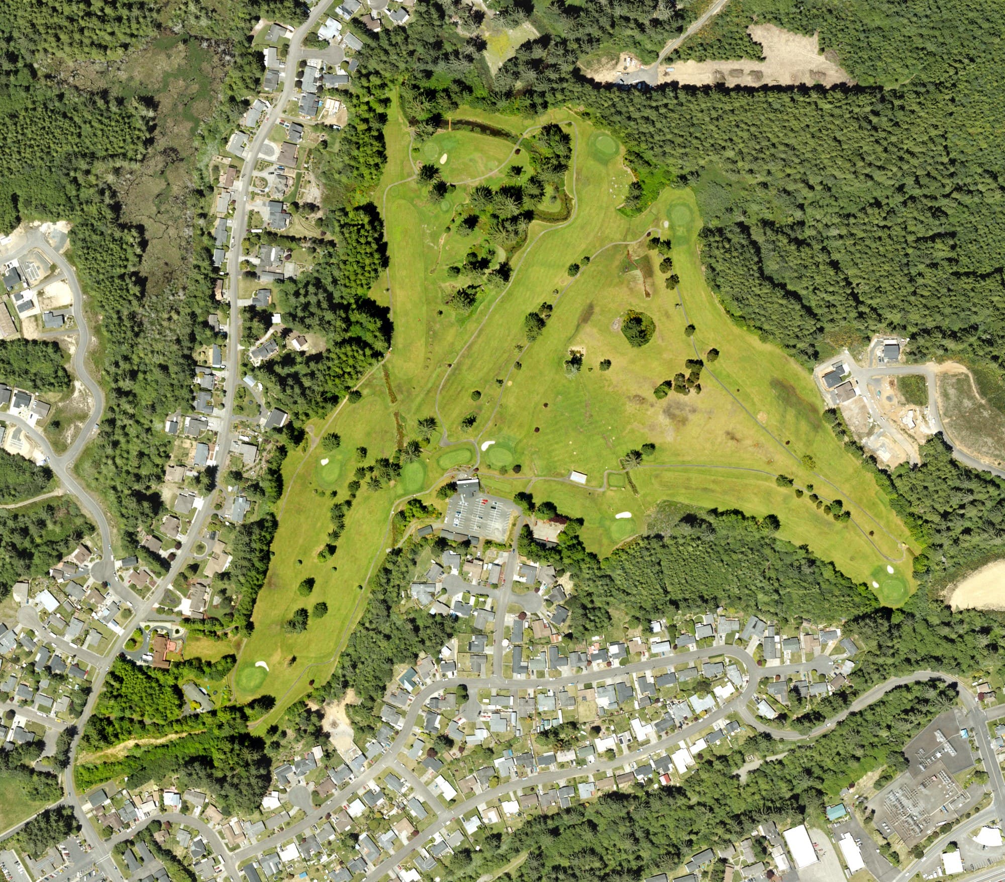 Aerial view of Forest Hills Country Club, OR, with its hole routing marked