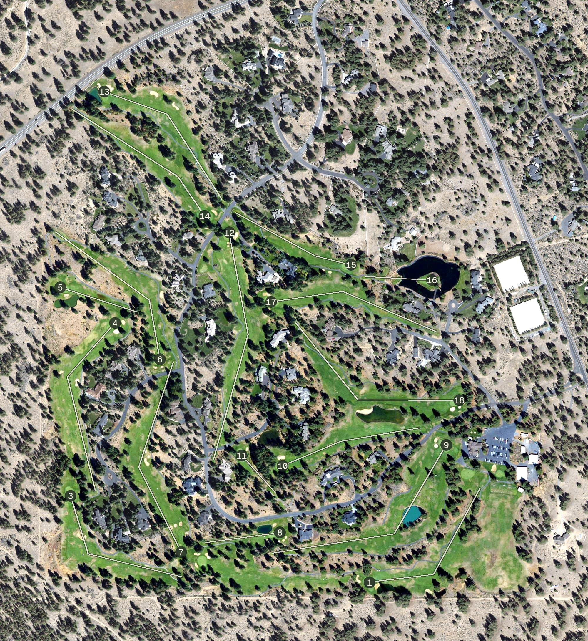 Aerial view of Lost Tracks Golf Course, OR, with its hole routing marked