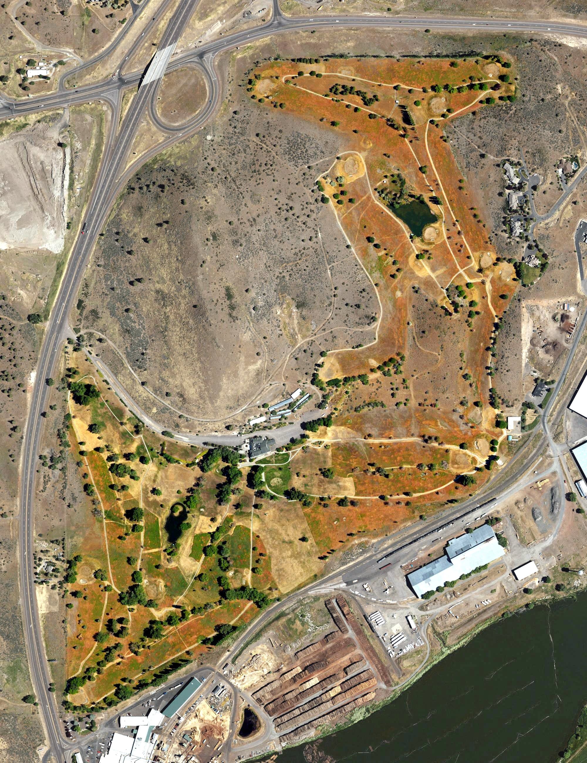 Aerial view of Reames Golf and Country Club, OR, with its hole routing marked