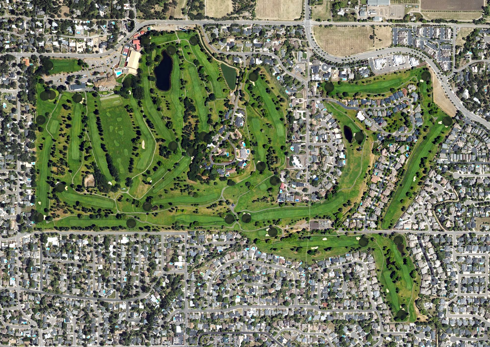 Aerial view of Rogue Valley Country Club, OR, with its hole routing marked