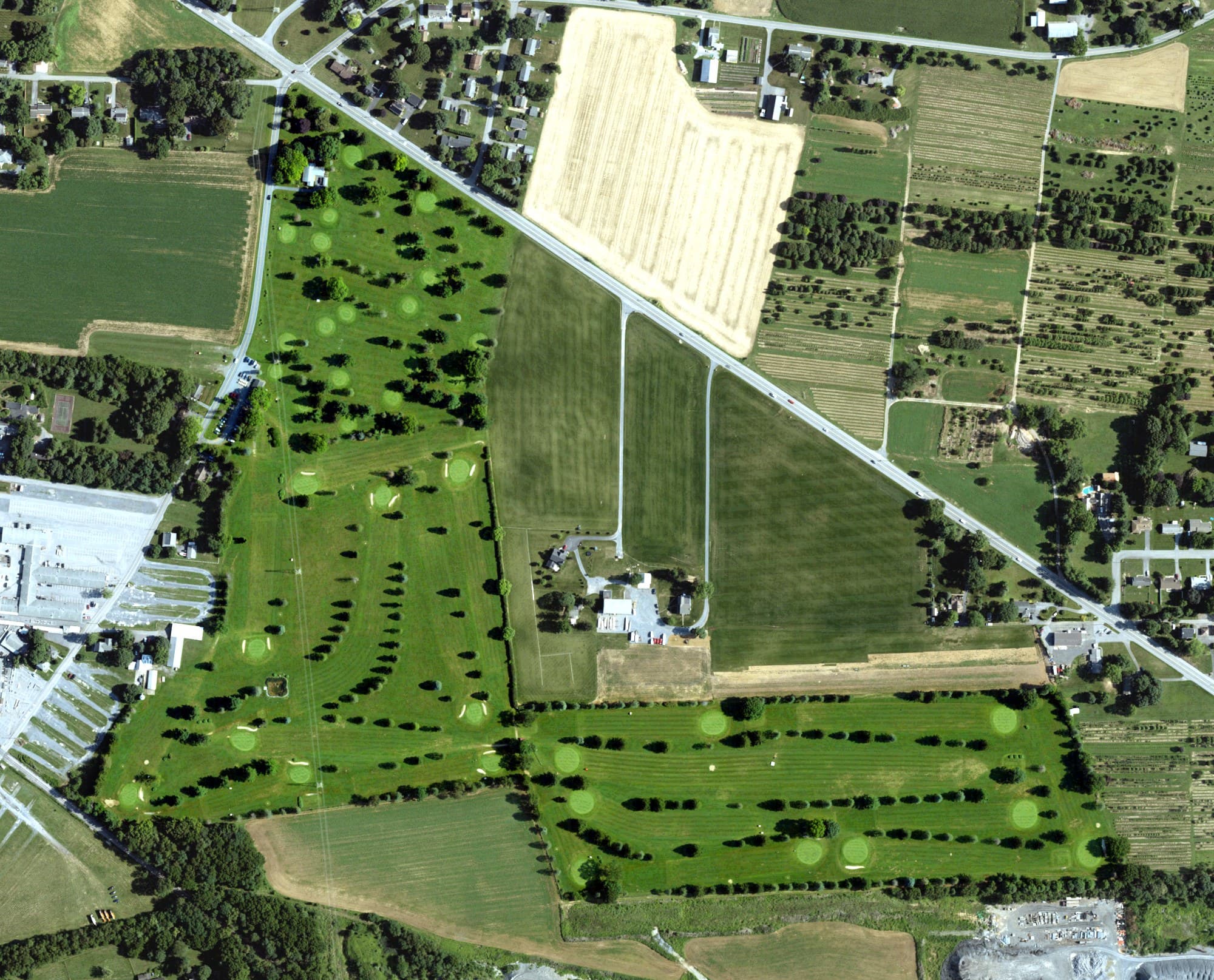 Aerial view of Evergreen Golf Inc., PA, with its hole routing marked