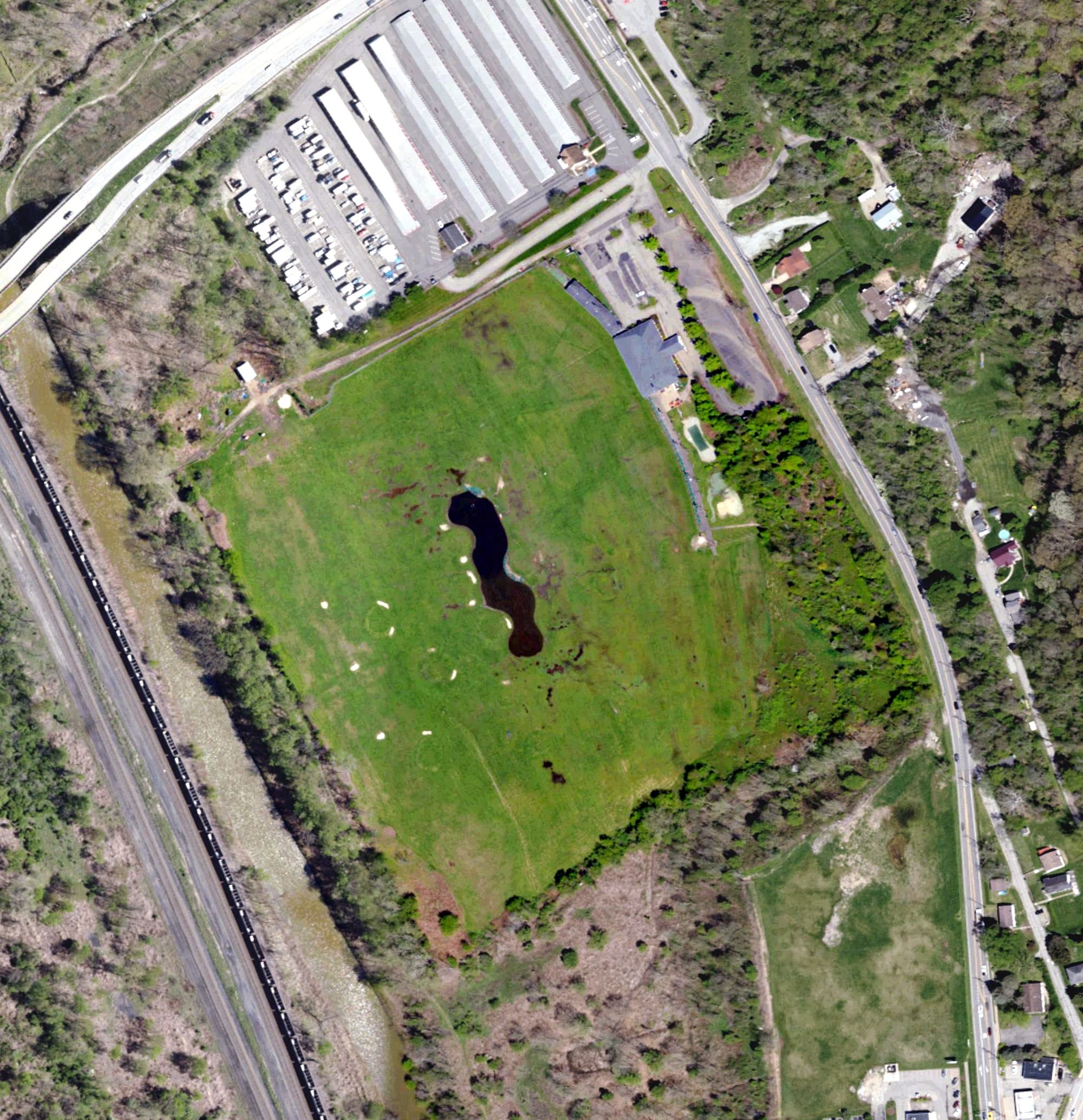 Aerial view of Mcdain Golf Center, PA, with its hole routing marked