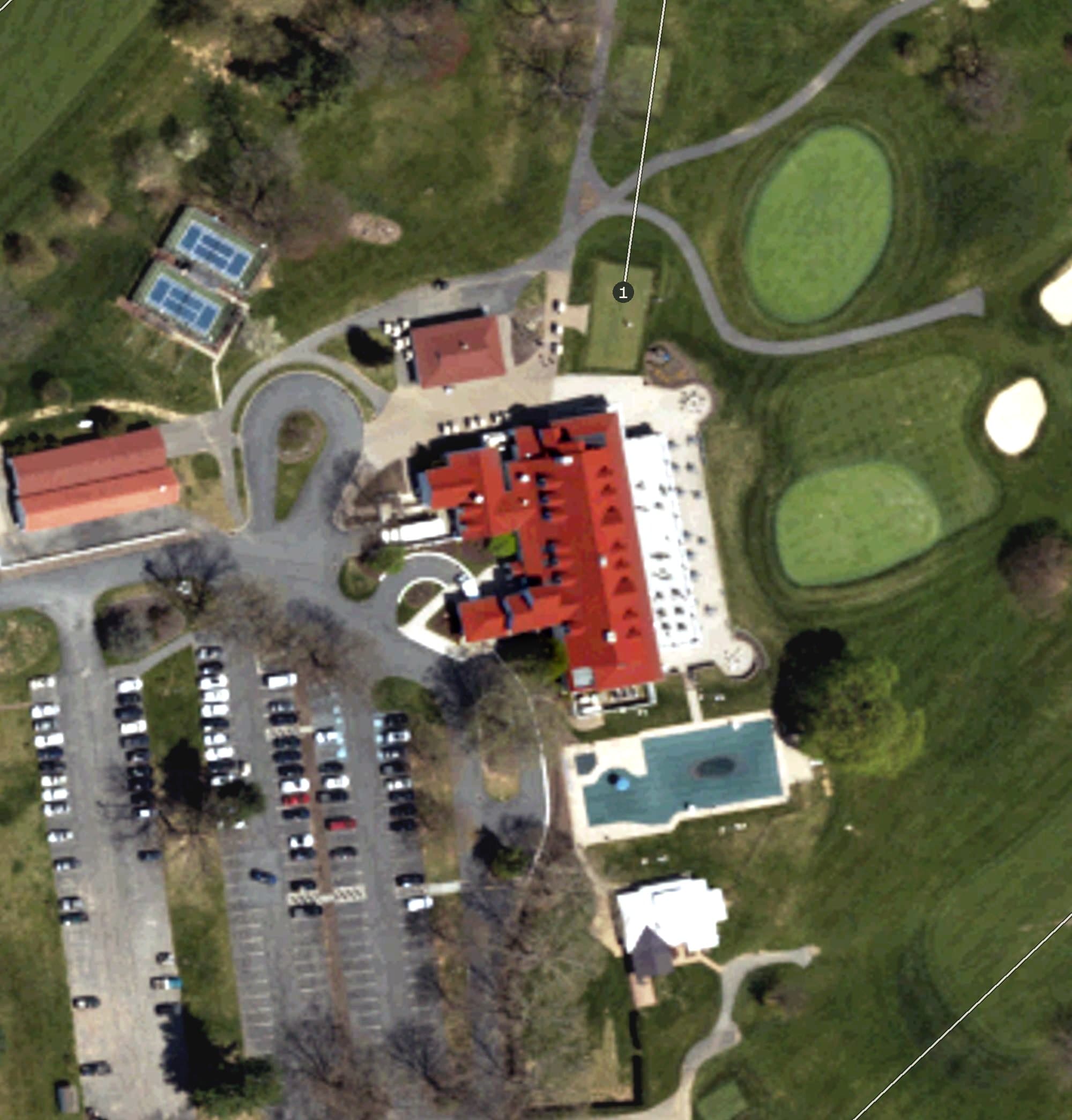 Aerial view of Northampton Country Club Clubhouse, PA, with its hole routing marked