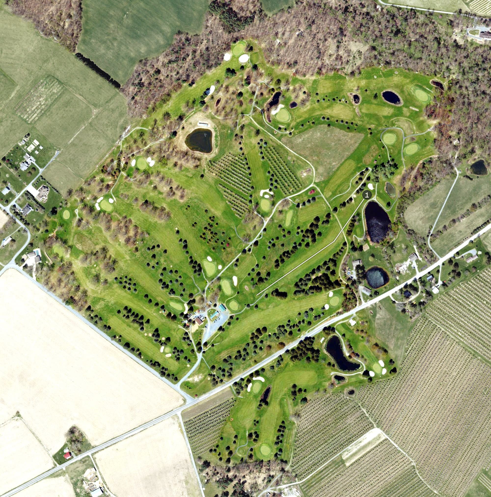 Aerial view of Piney Apple Golf Course, PA, with its hole routing marked