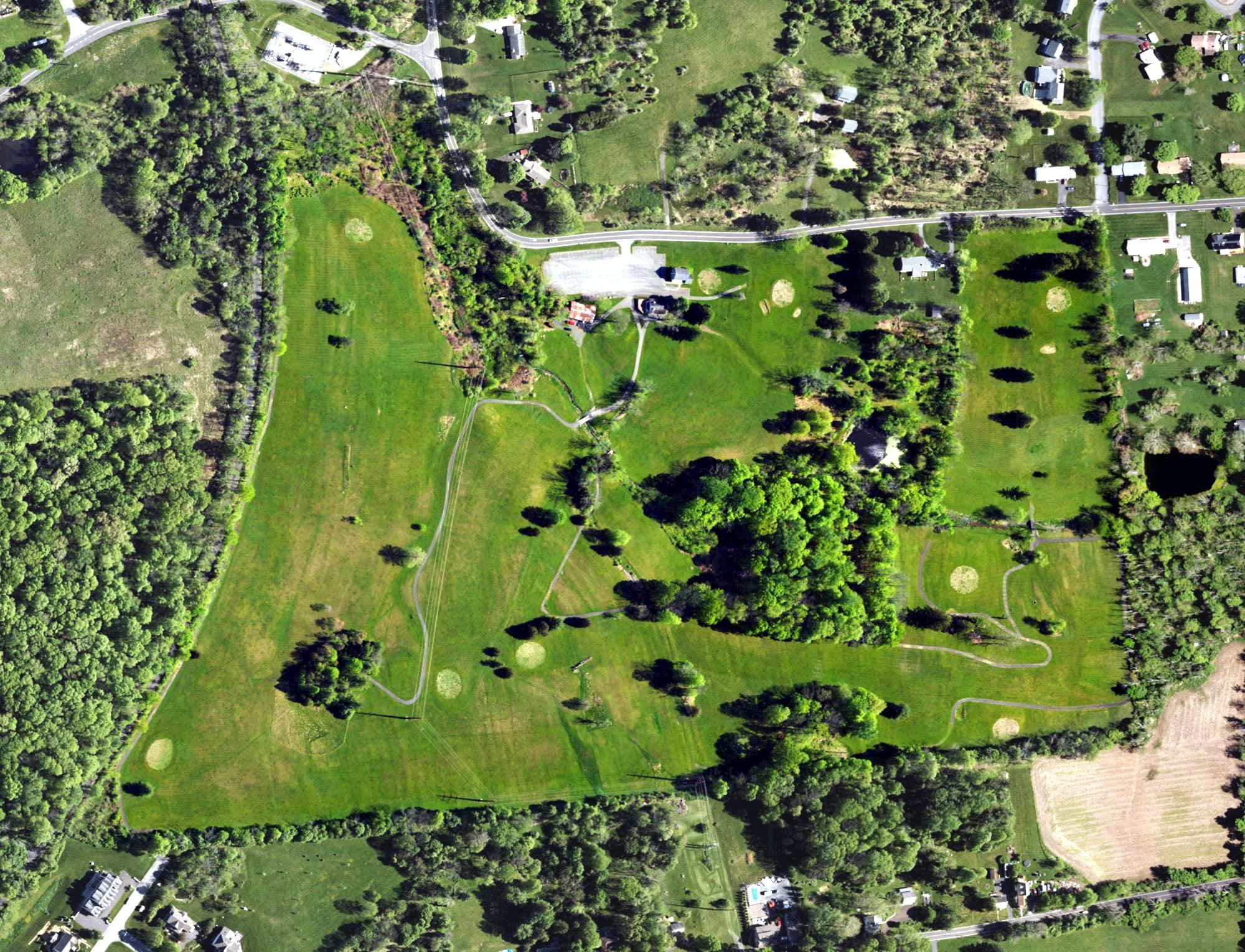 Aerial view of Tumblebrook Golf Course, PA, with its hole routing marked
