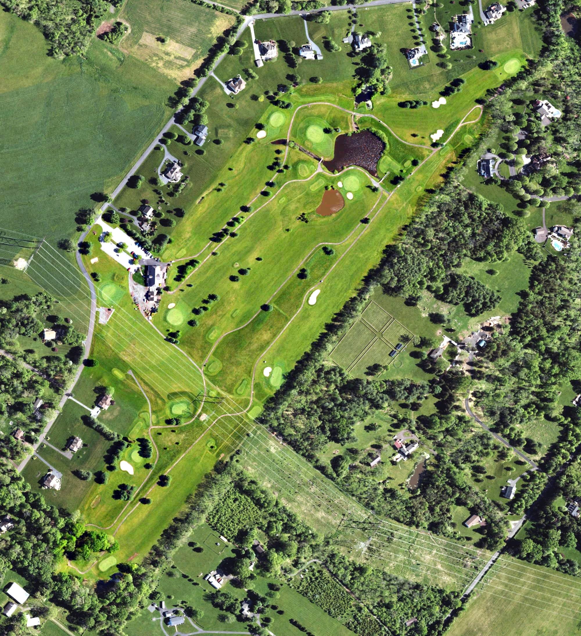 Aerial view of Worcester Golf Club, PA, with its hole routing marked